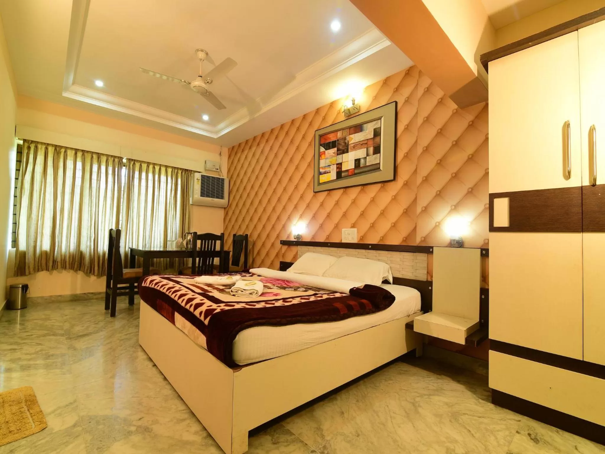 Bed in Hotel Ashlesh Manipal