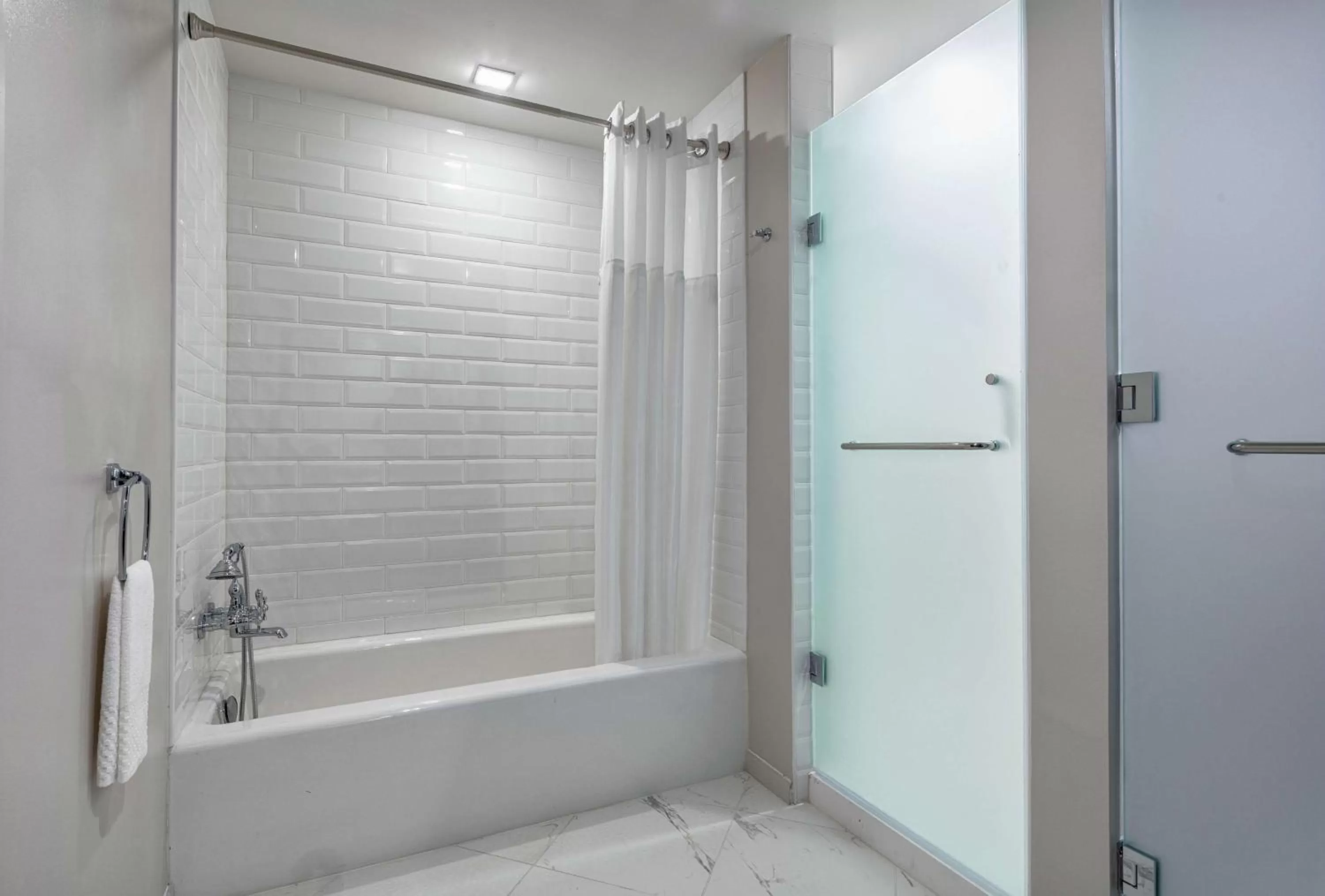 Bathroom in The Higgins Hotel New Orleans, Curio Collection by Hilton