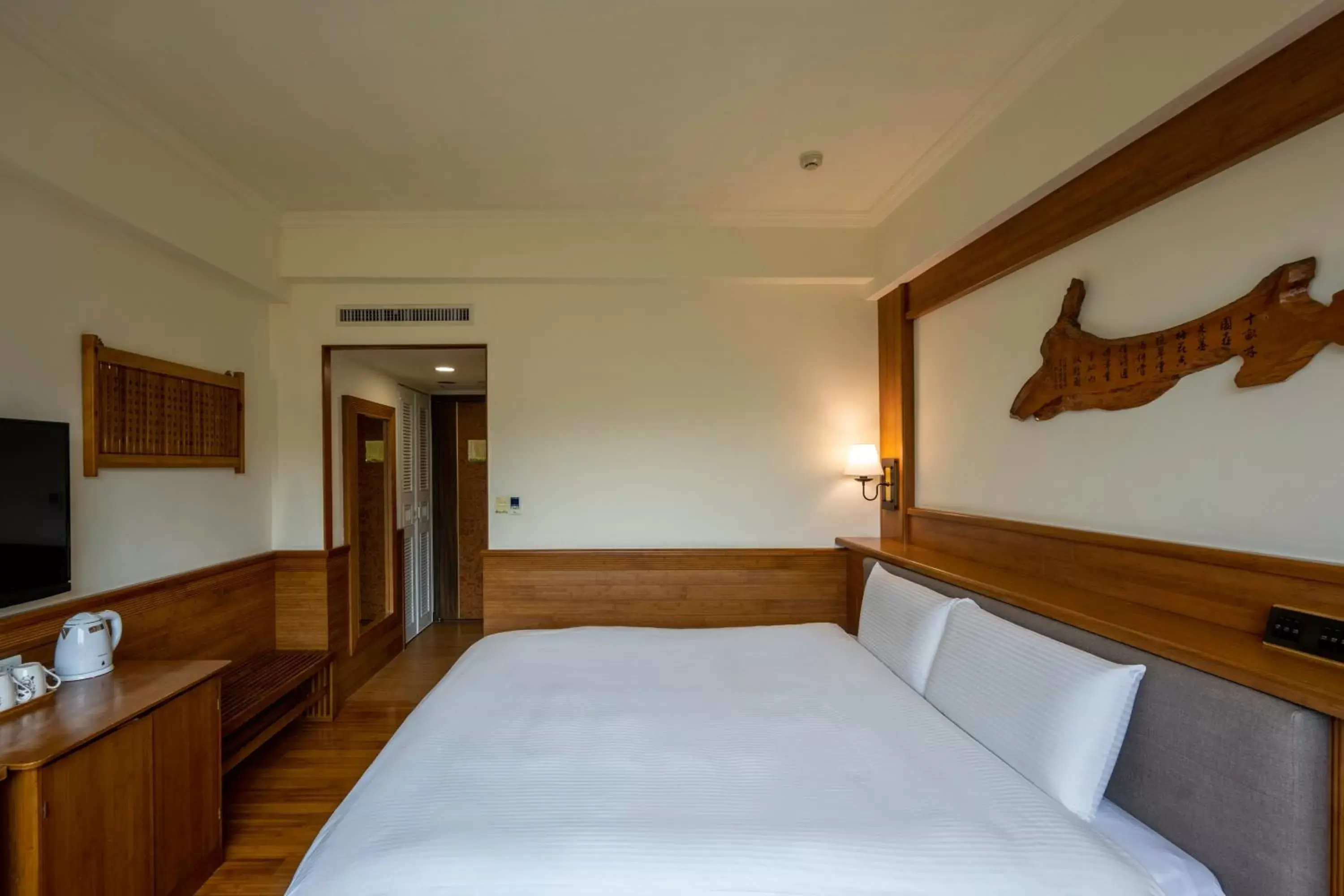 Bed in Ginkgo Hotel