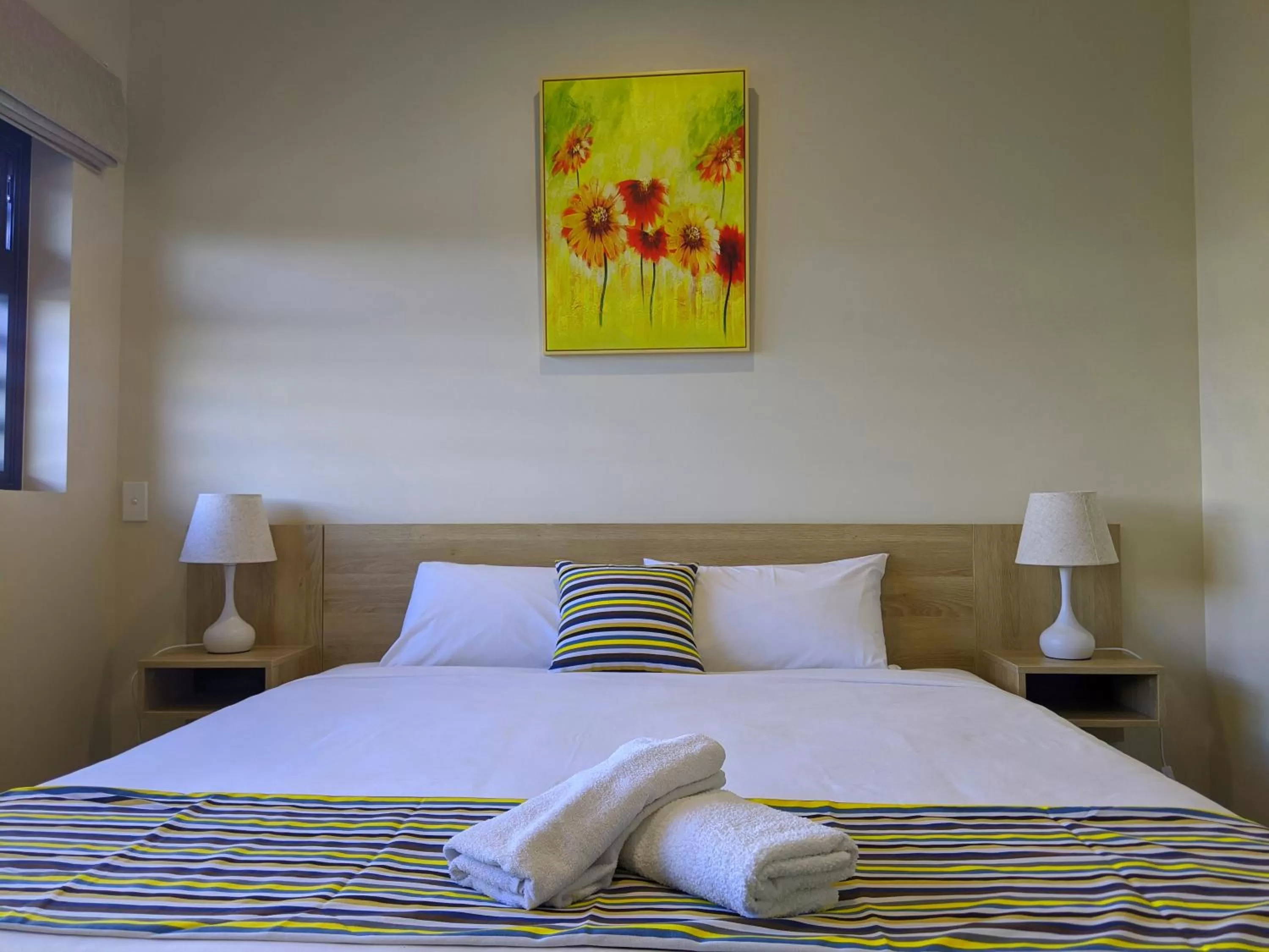 Bed in The Windsor, Hotel Rooms & Apartments