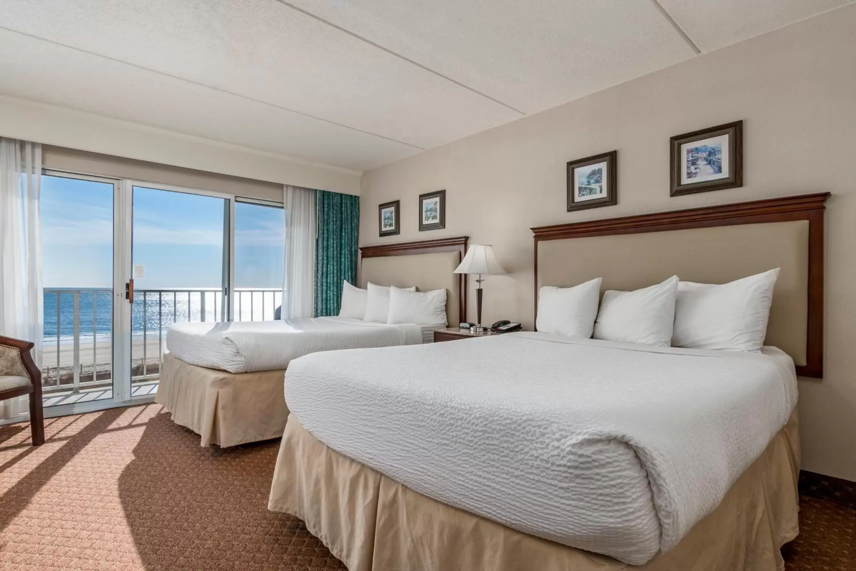 Bed in Princess Royale Oceanfront Resort
