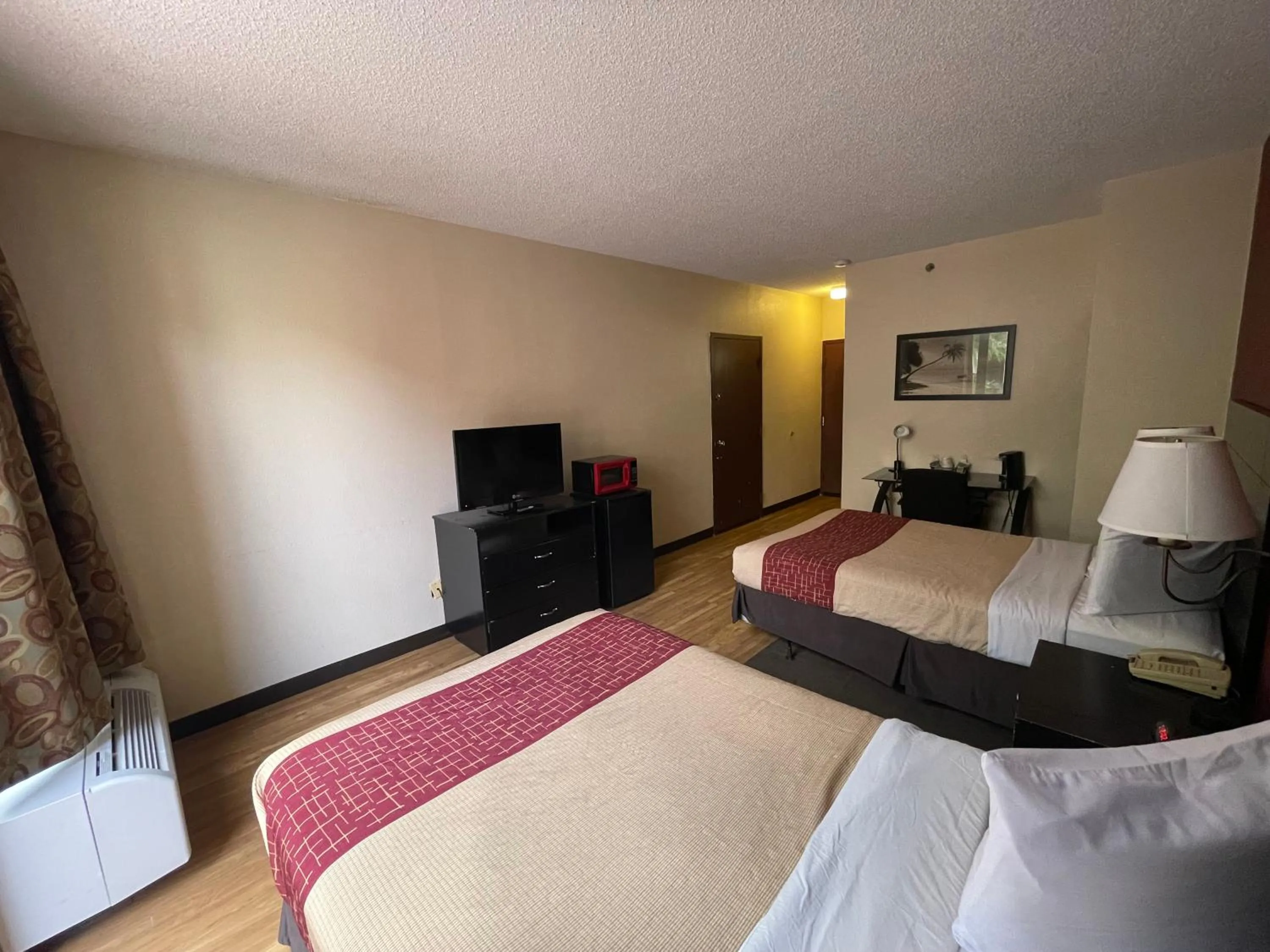 Photo of the whole room in Tropical Palms Hotel