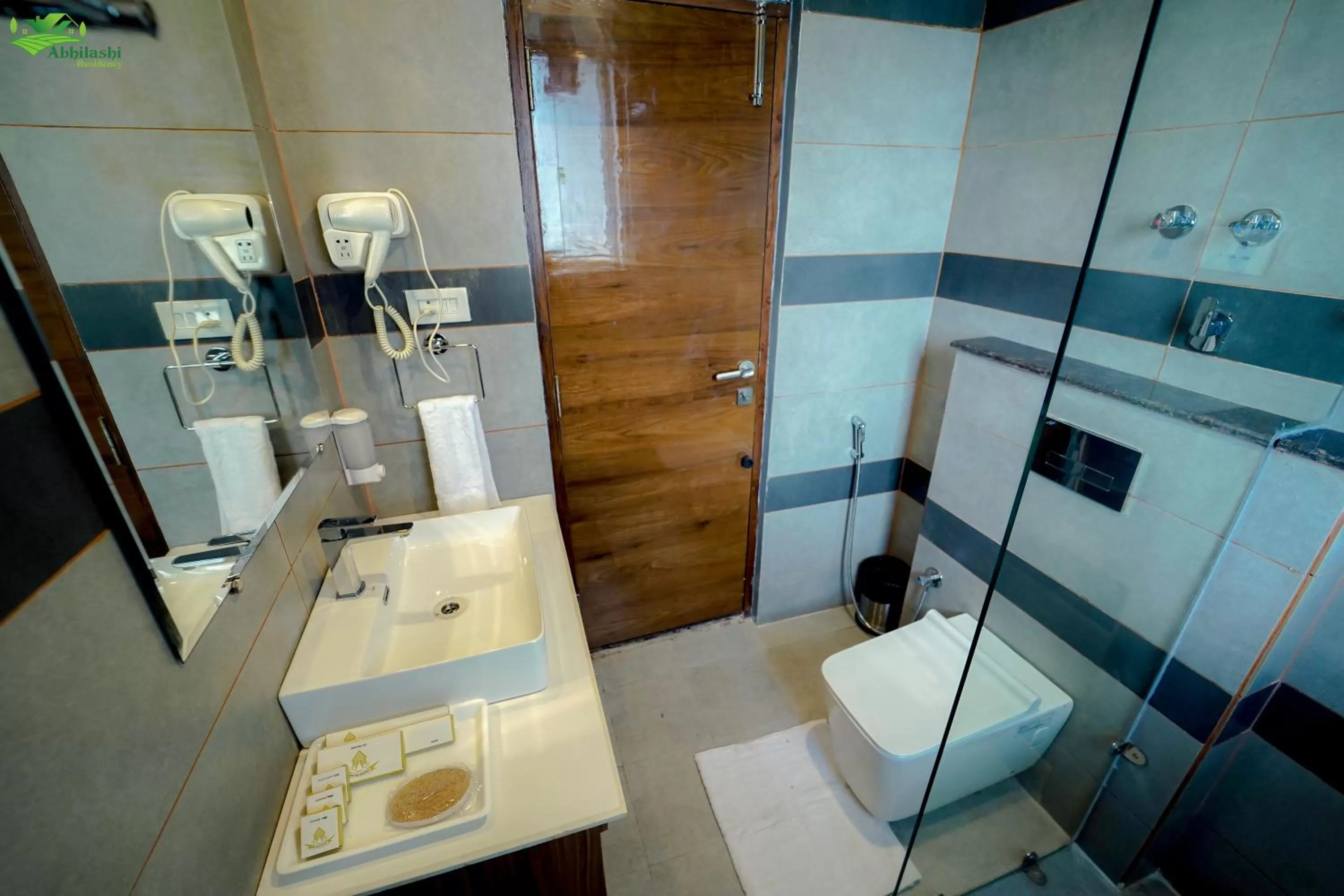 Bathroom in Abhilashi Residency & Spa - Centrally Heated & Air Cooled