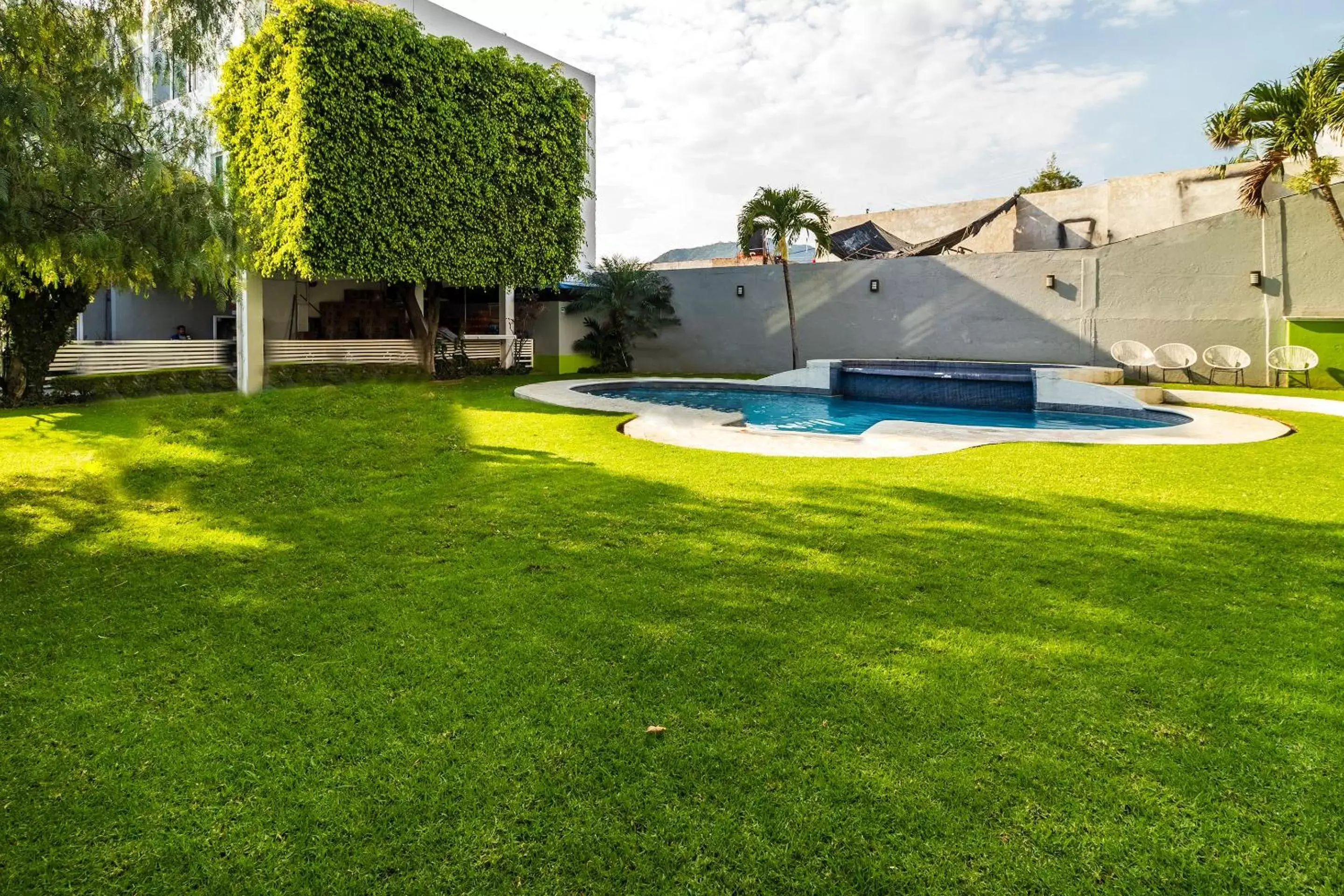 Garden, Swimming Pool in Collection O Hotel Mango,Six Flags Hurricane Harbor Oaxtepec