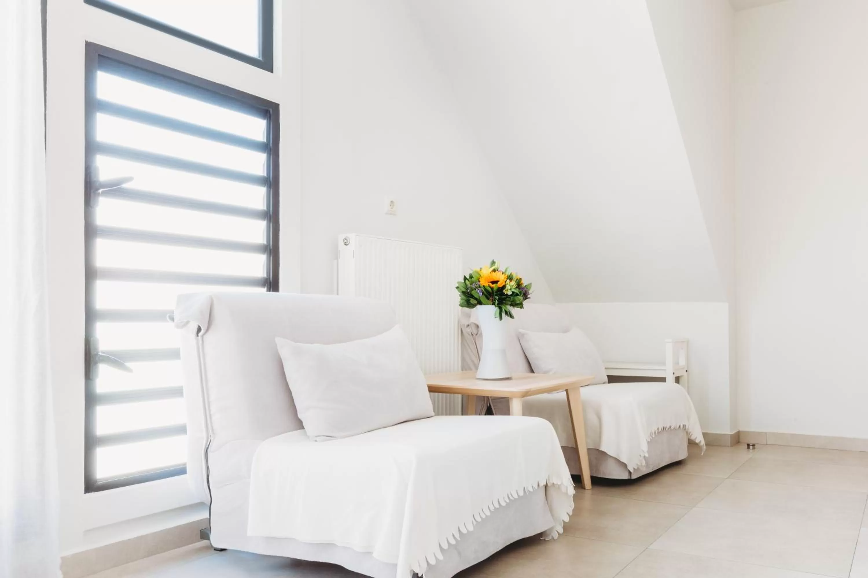 Seating area, Bed in Athens Studios