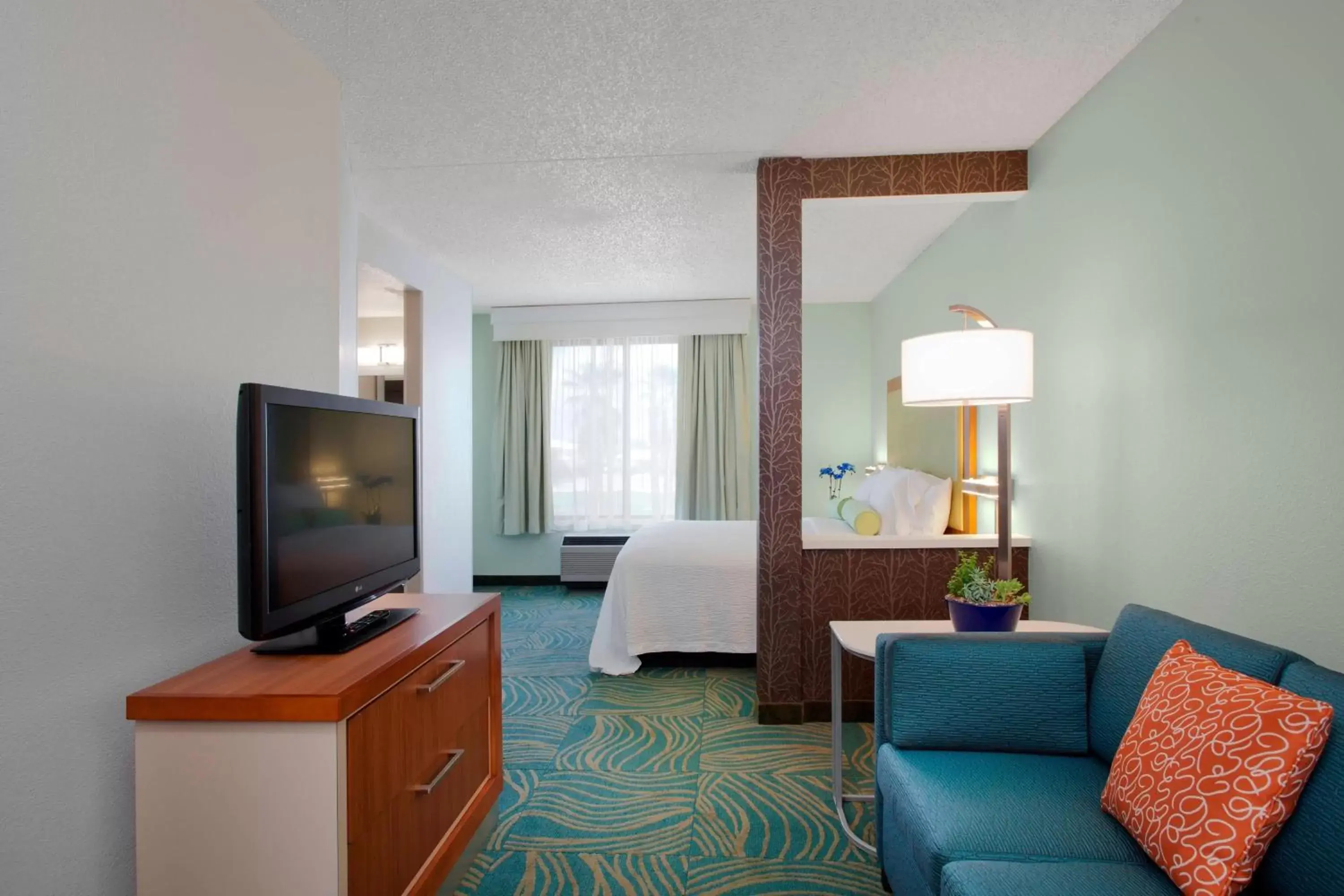 Photo of the whole room, TV/Entertainment Center in SpringHill Suites Phoenix Downtown
