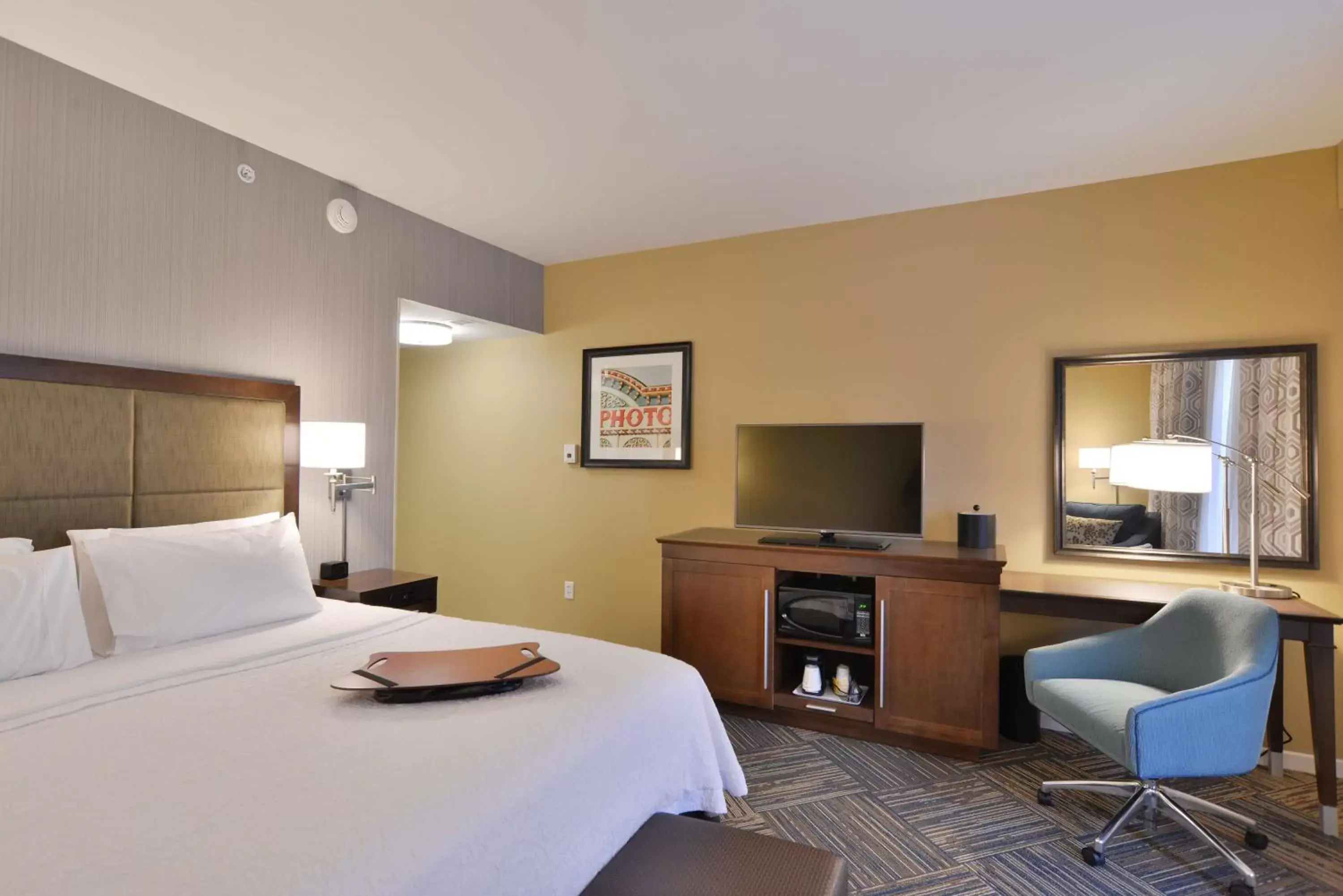 Communal lounge/ TV room, TV/Entertainment Center in Hampton Inn & Suites Chippewa Falls