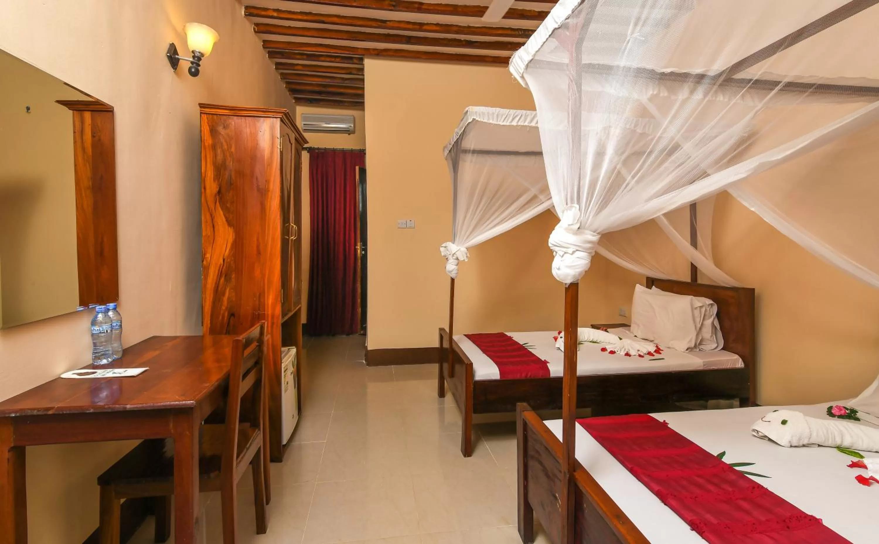 Bed in Amaan Beach Bungalows