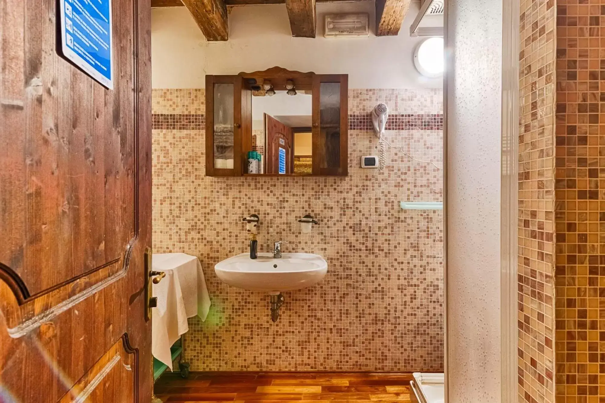 Bathroom in Hotel Portacavana