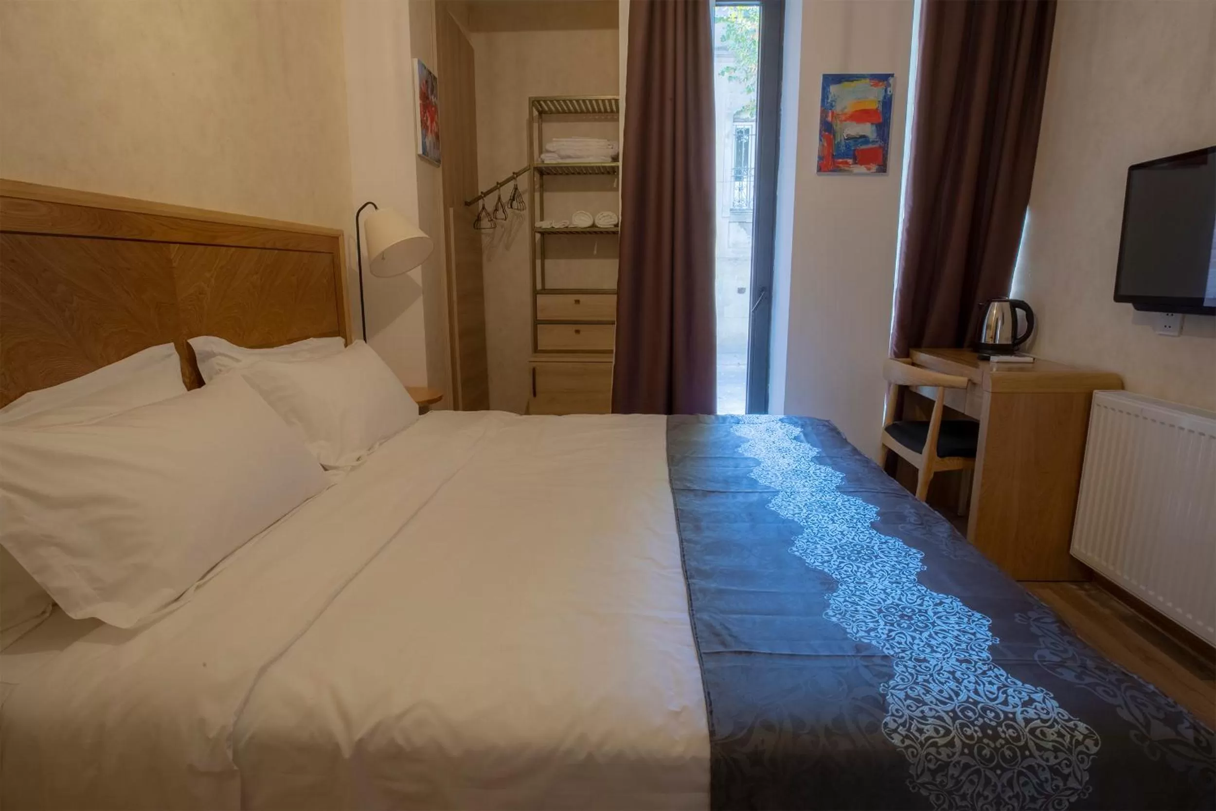 Bed in Ornament Boutique Hotel