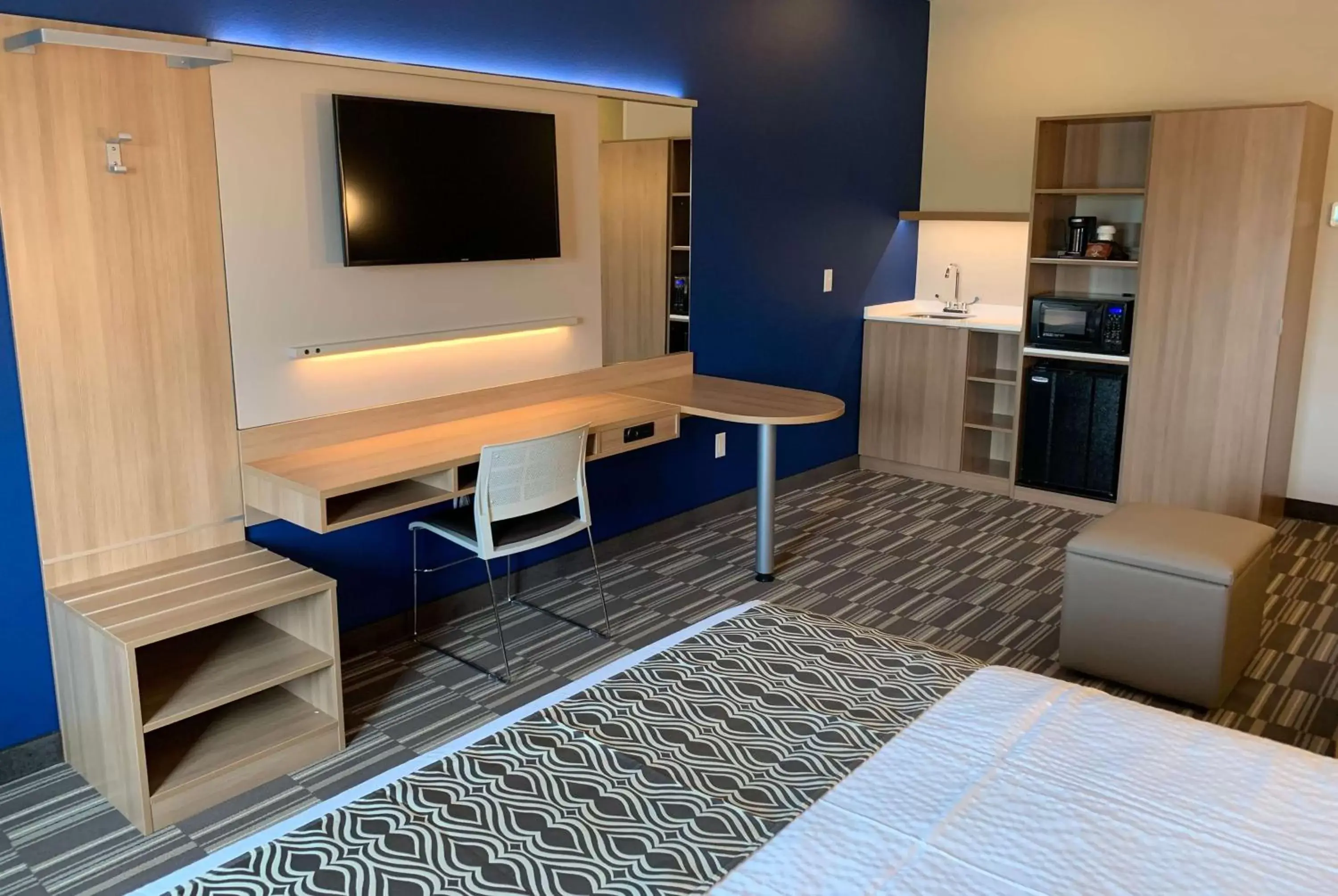 Photo of the whole room, TV/Entertainment Center in Microtel Inn & Suites by Wyndham Fountain North