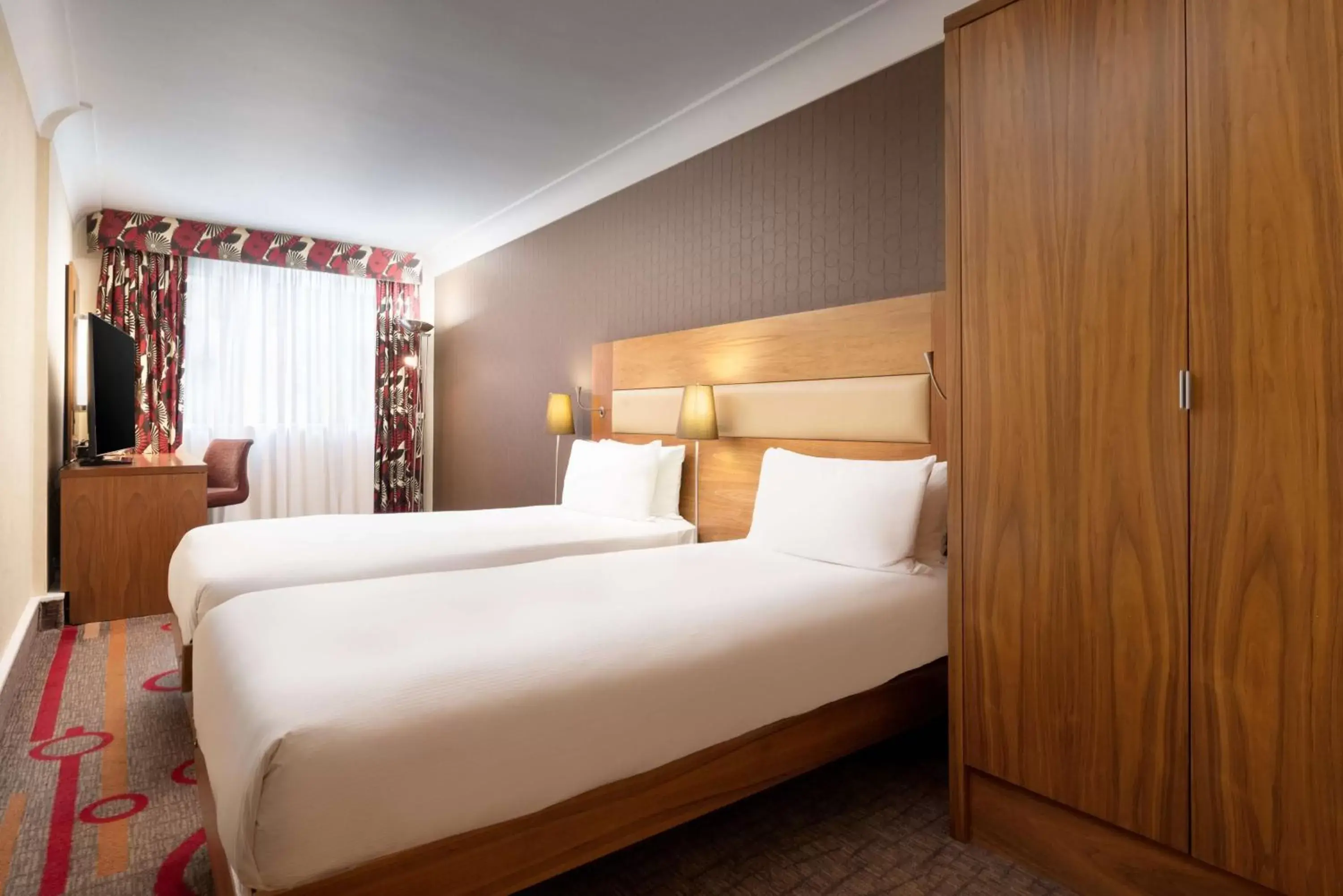 Bed in Hilton London Olympia