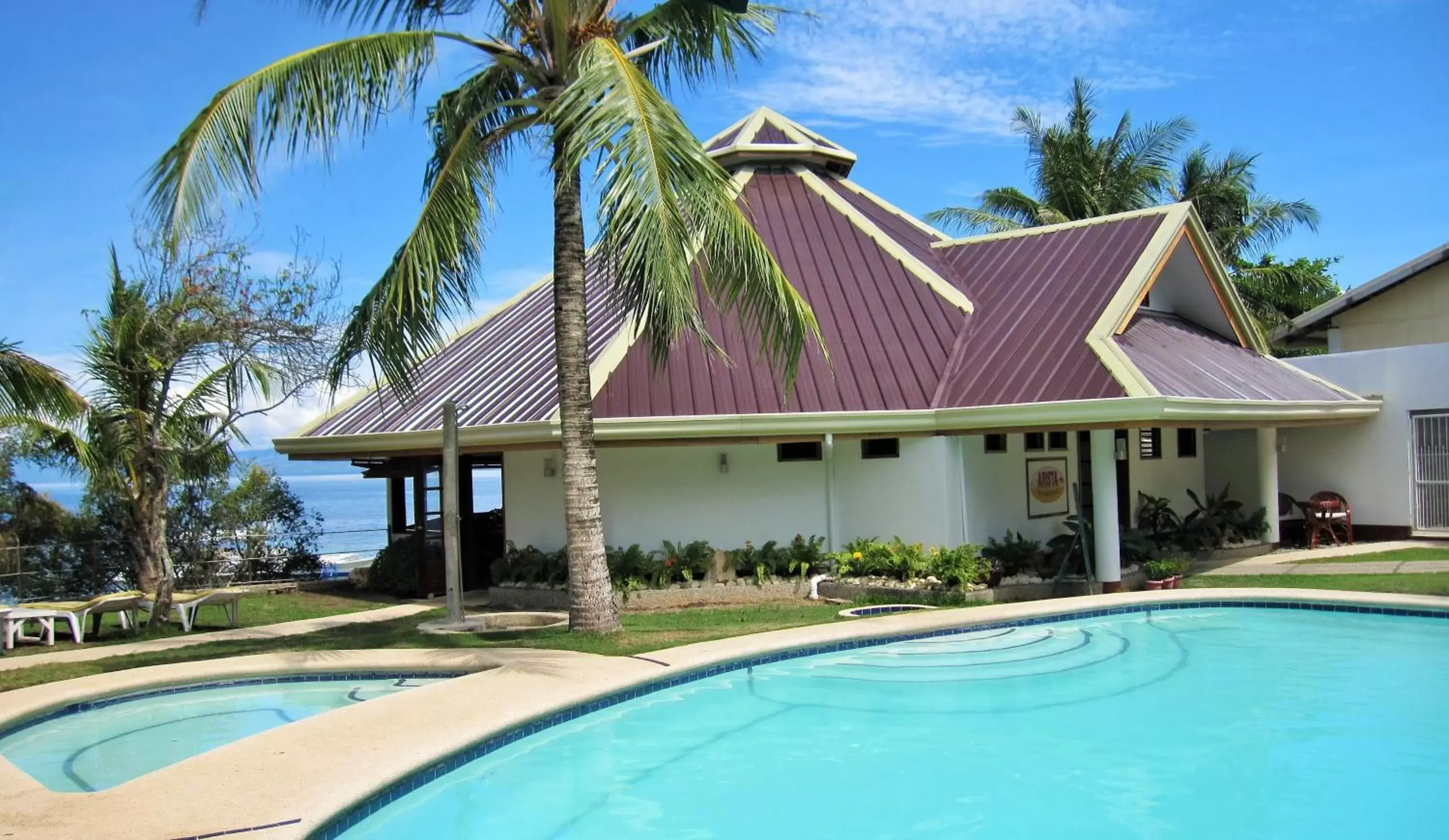 Pool view, Property Building in Quo Vadis Dive Resort