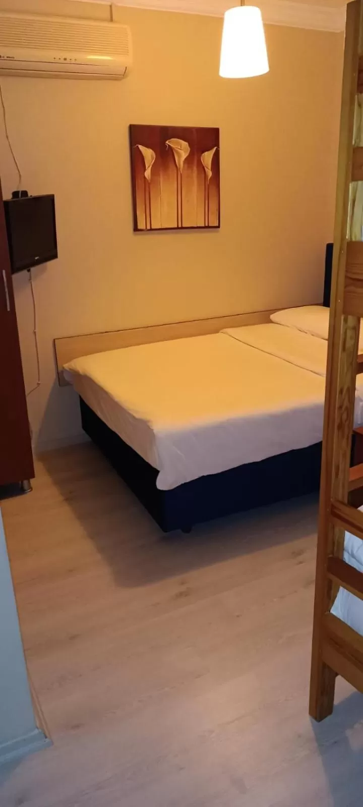 Bed in Hotel Crowded House