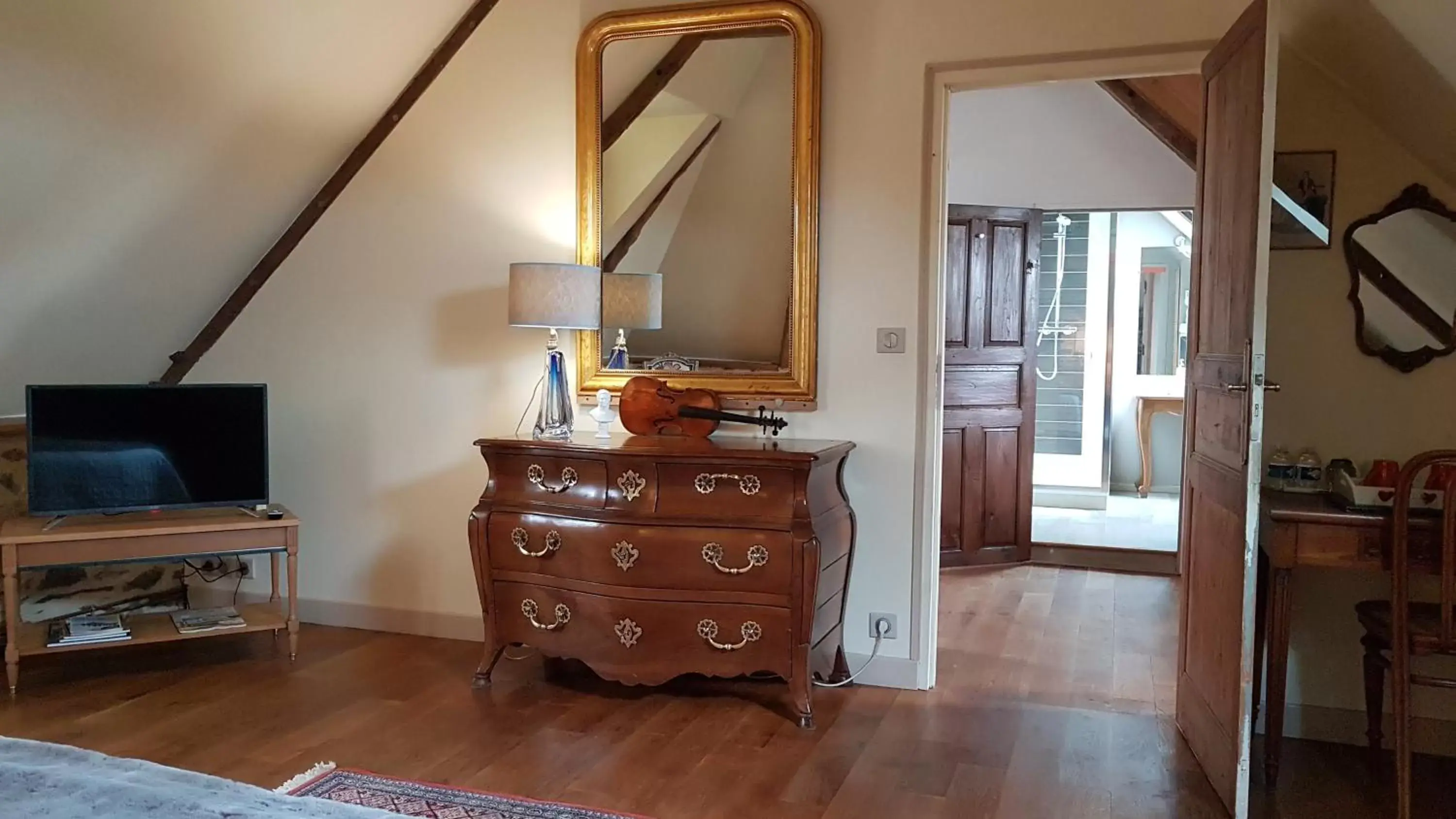 Decorative detail, TV/Entertainment Center in Le Manoir de la Bigotière