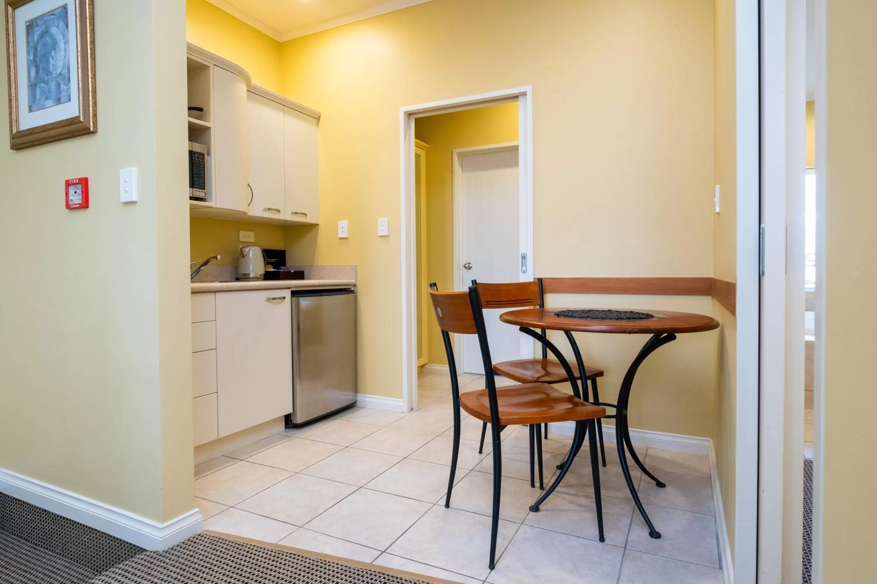 Kitchen or kitchenette in Motel de la Mer