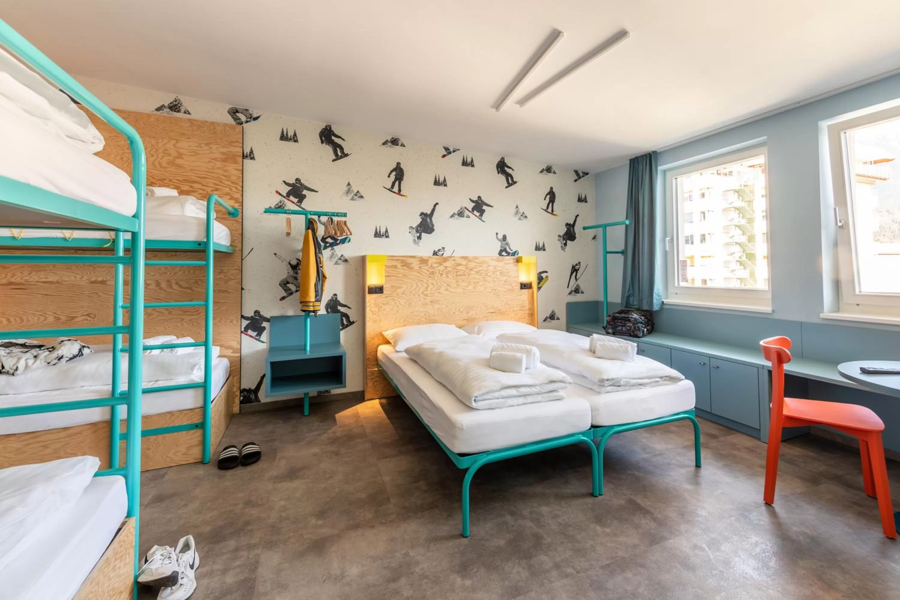 Photo of the whole room, Bed in MEININGER Hotel Innsbruck Zentrum