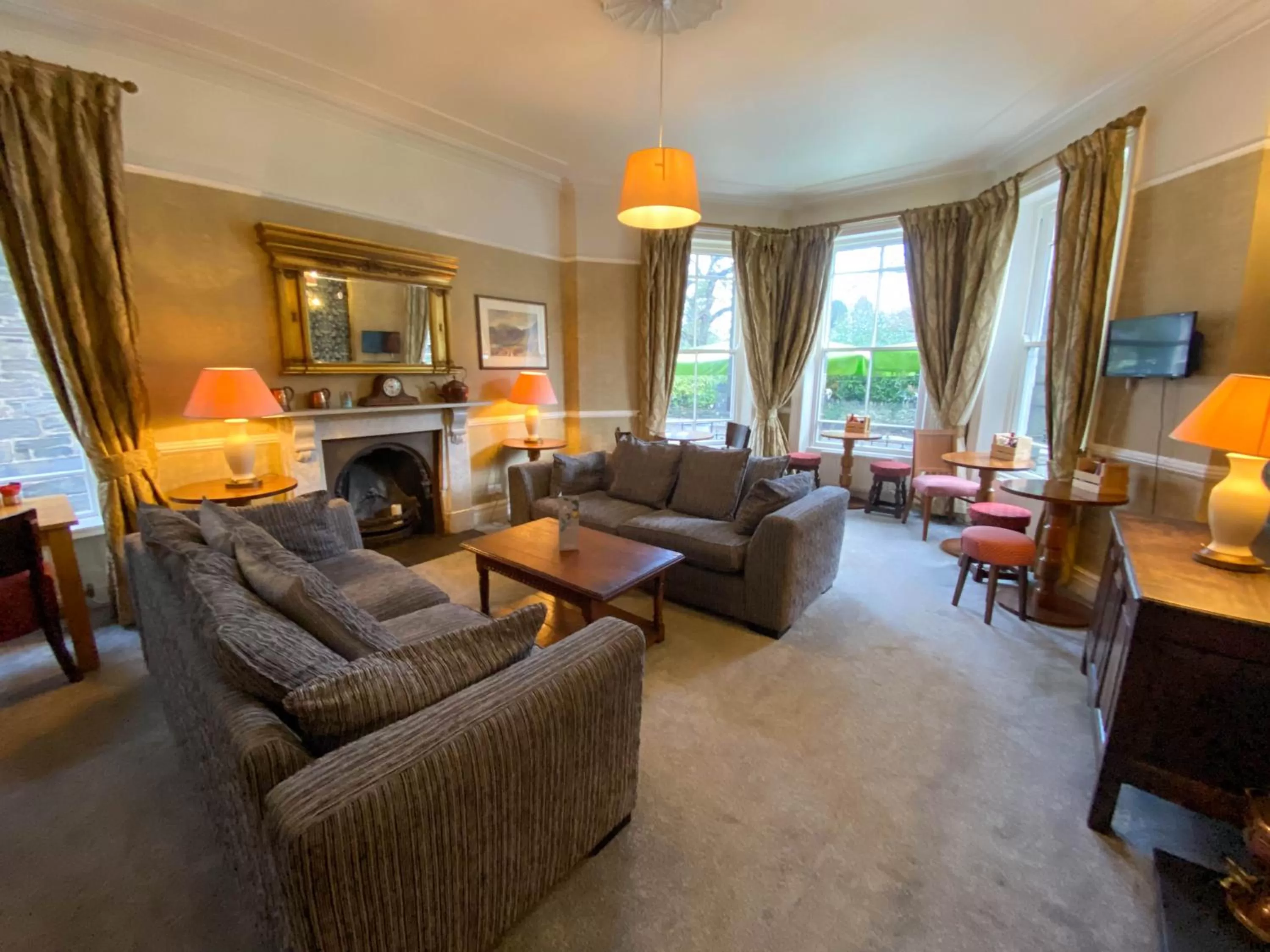 Communal lounge/ TV room in Glan Aber Hotel