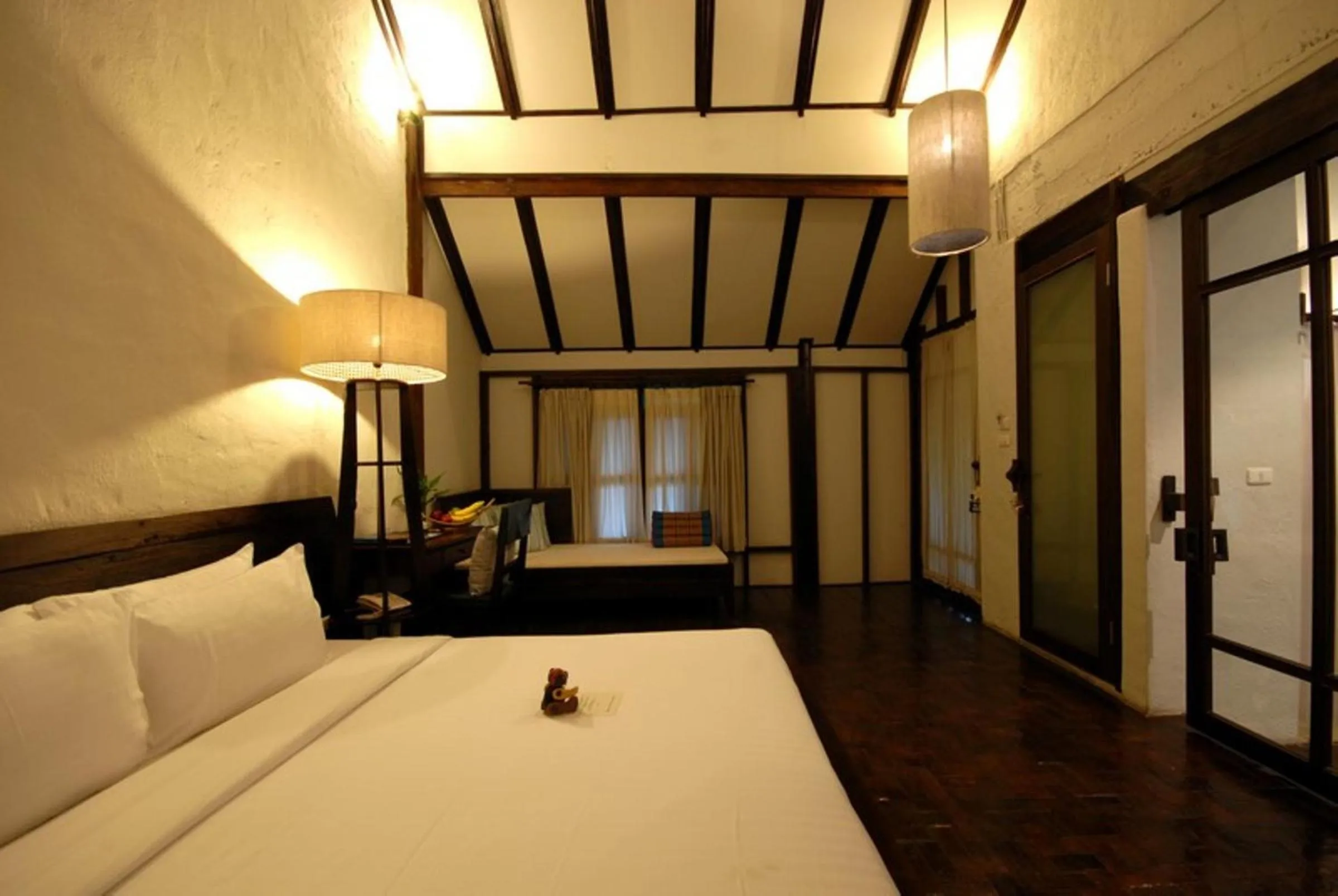 Photo of the whole room, Bed in Banthai Village