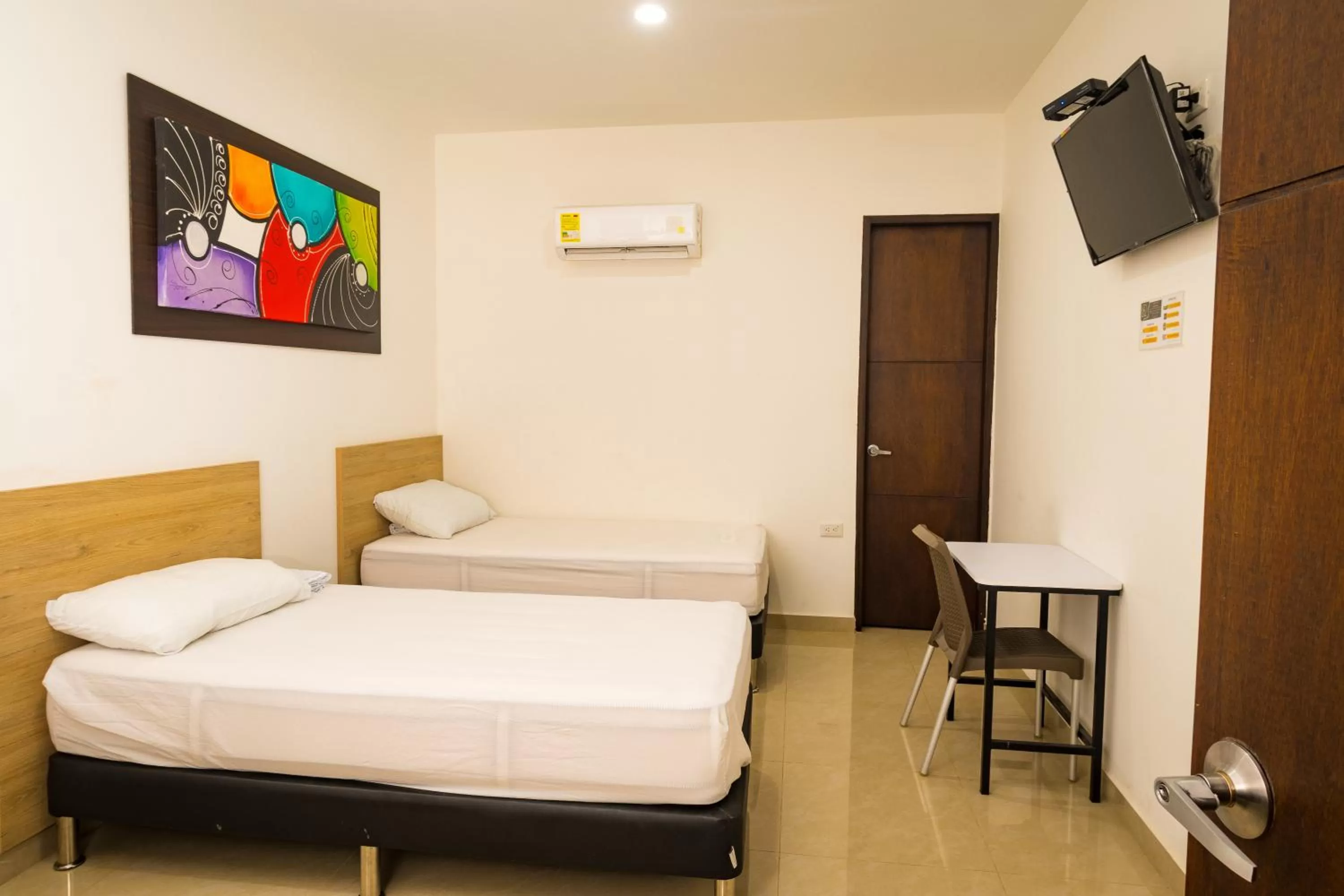 TV and multimedia, Bed in Genesis Hotel