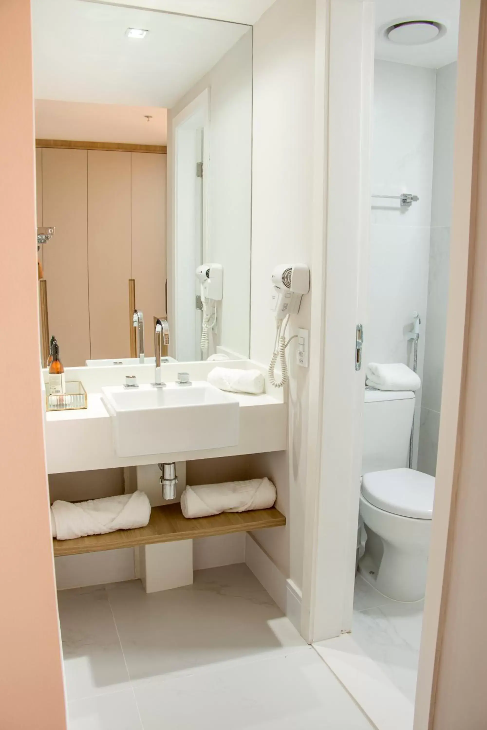 Bathroom in Ramada Hotel & Suites Campos Pelinca
