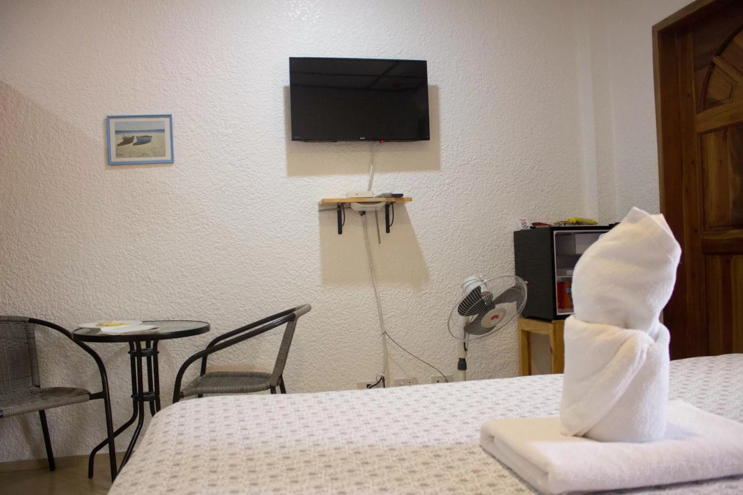 TV/Entertainment Center in Jugalis Hotel and Restaurant