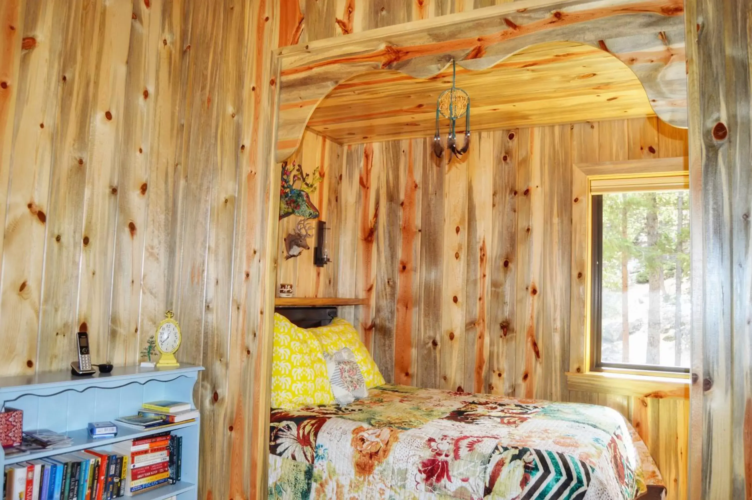 Bed in The Inn on Fall River & Fall River Cabins