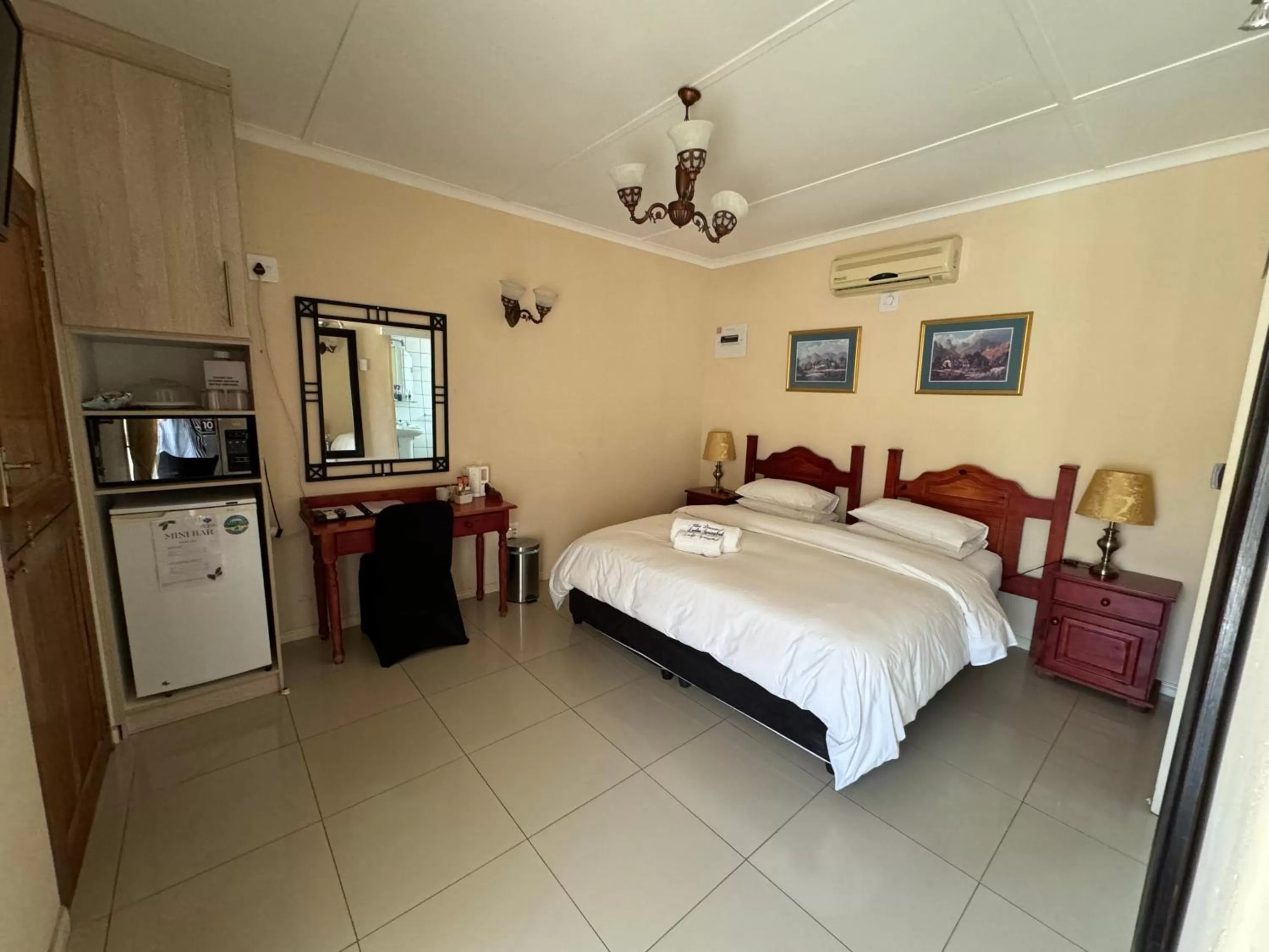 Bed in Blue Diamond Lodge & Spa