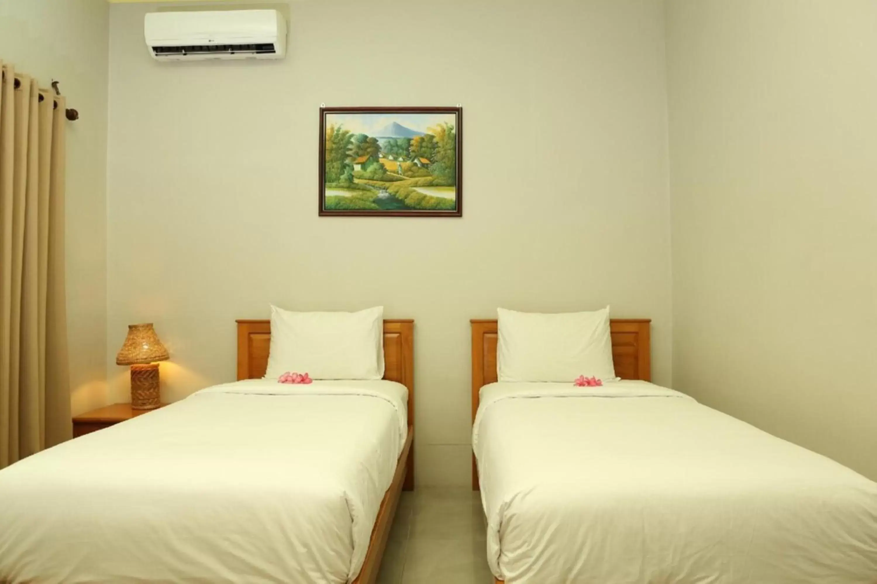 Bedroom in Senggigi Cottages Lombok