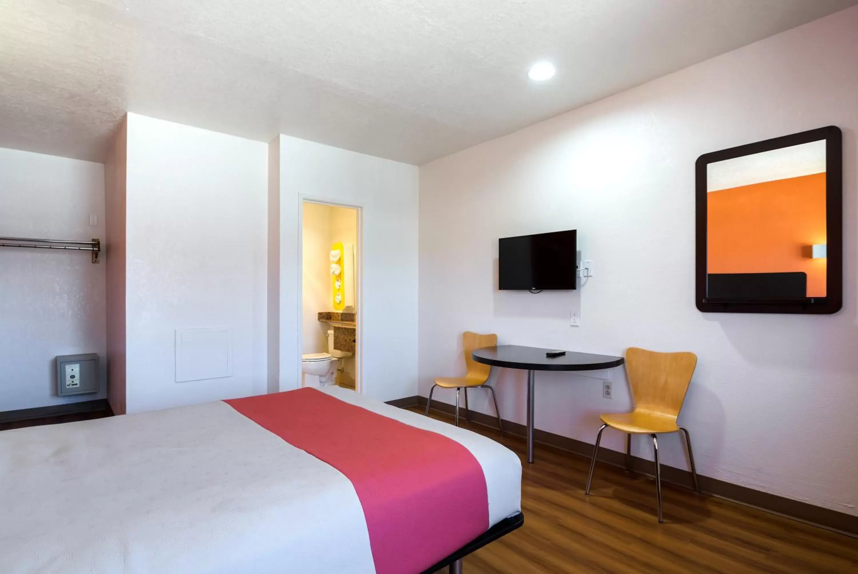 Bedroom, TV/Entertainment Center in Motel 6-Santa Fe, NM - Downtown