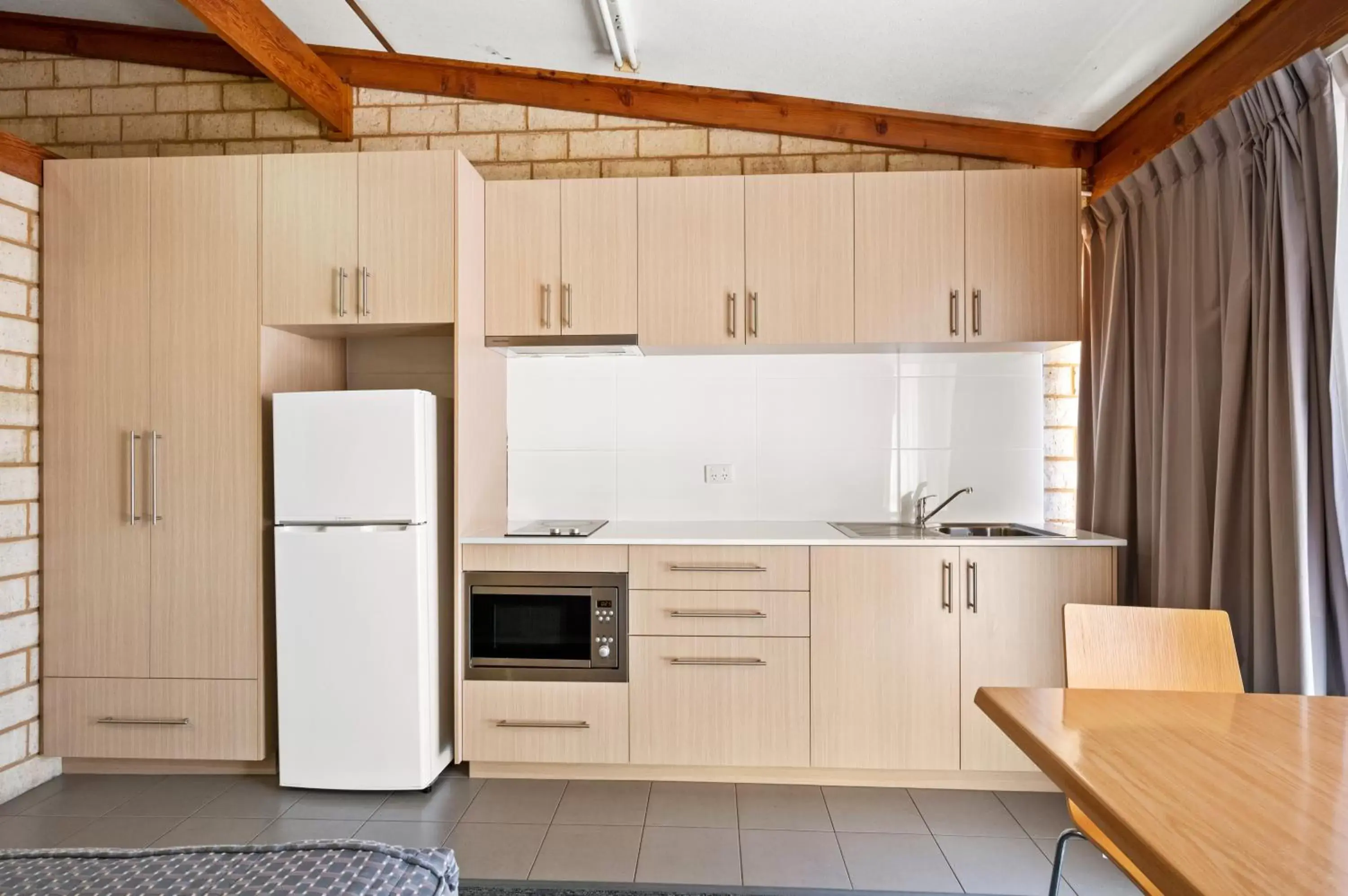 Kitchen or kitchenette in The View On Hannans Kalgoorlie Kitchen or kitchenette in The View On Hannans Kalgoorlie