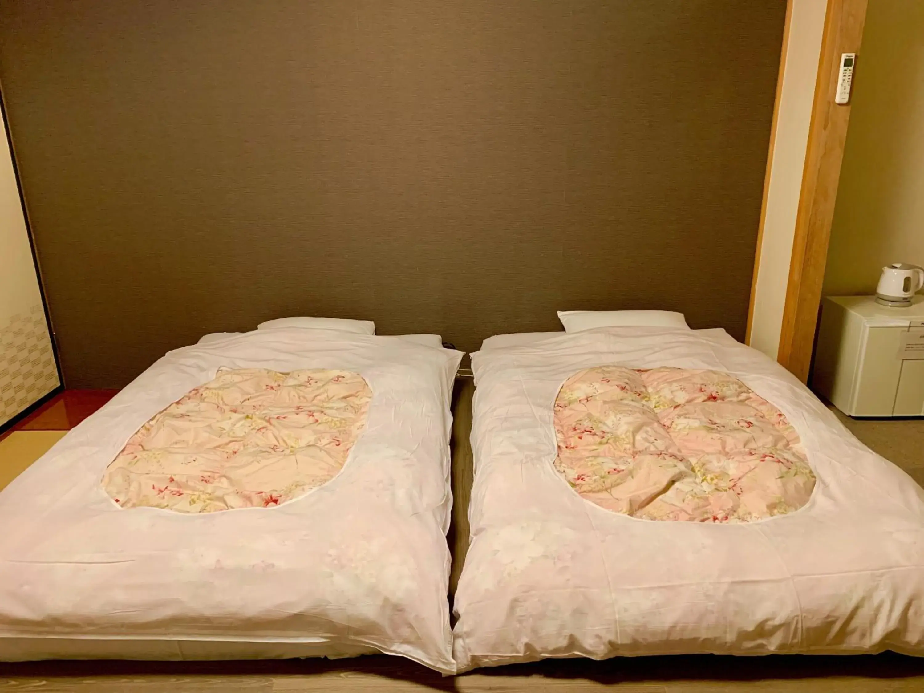 Bed in Granvillage Toya Daiwa Ryokan Annex