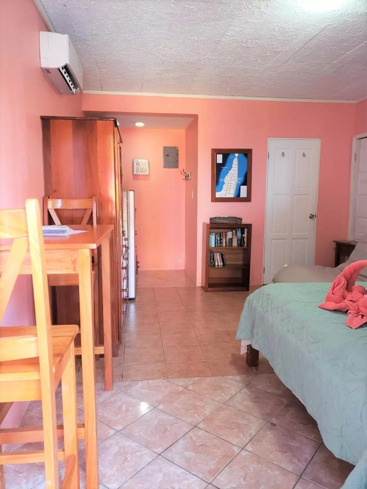 Bed in Beach Side Condos Caye Caulker by CCVH