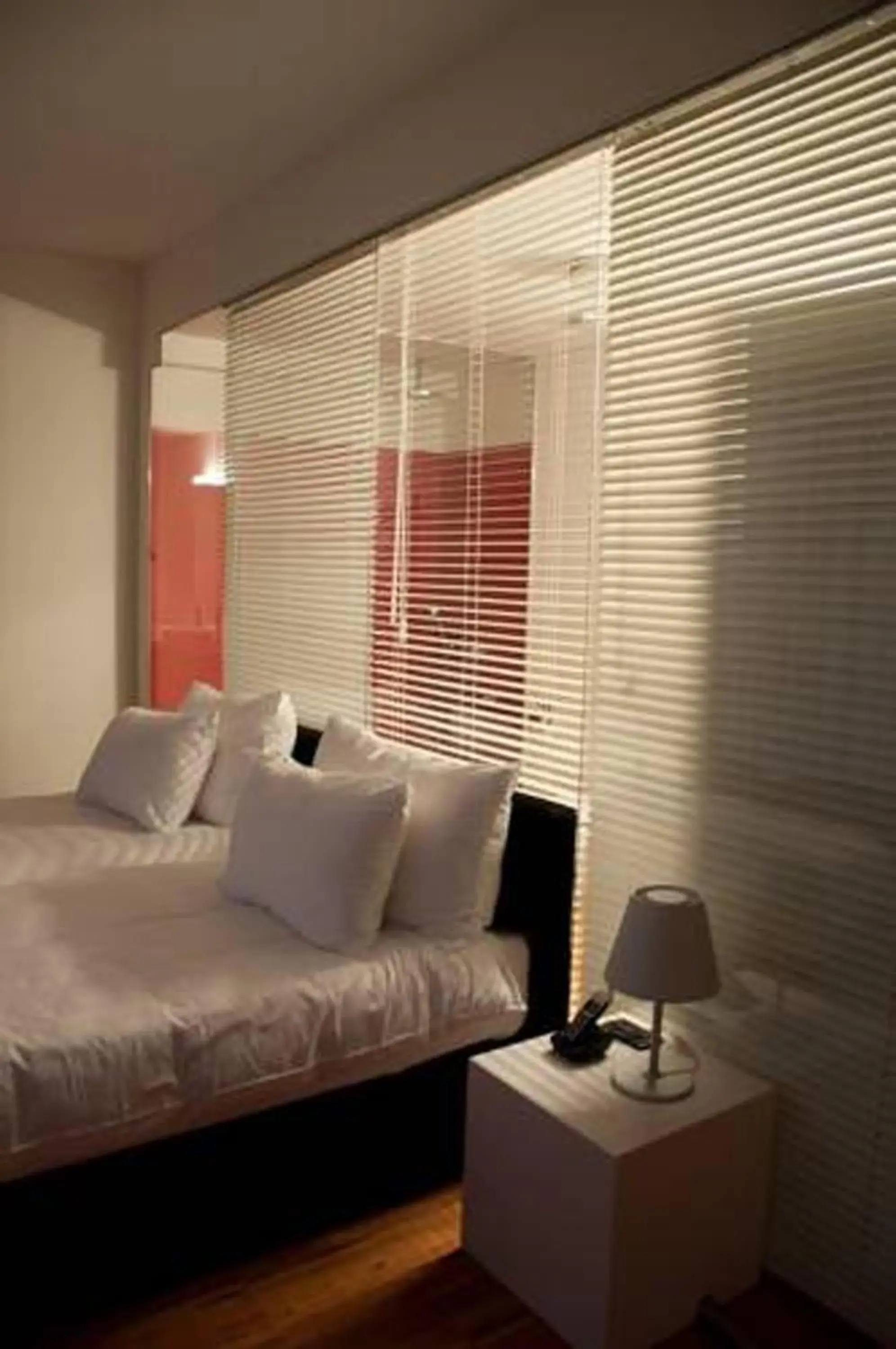 Bed, Seating Area in Sarroglia Hotel