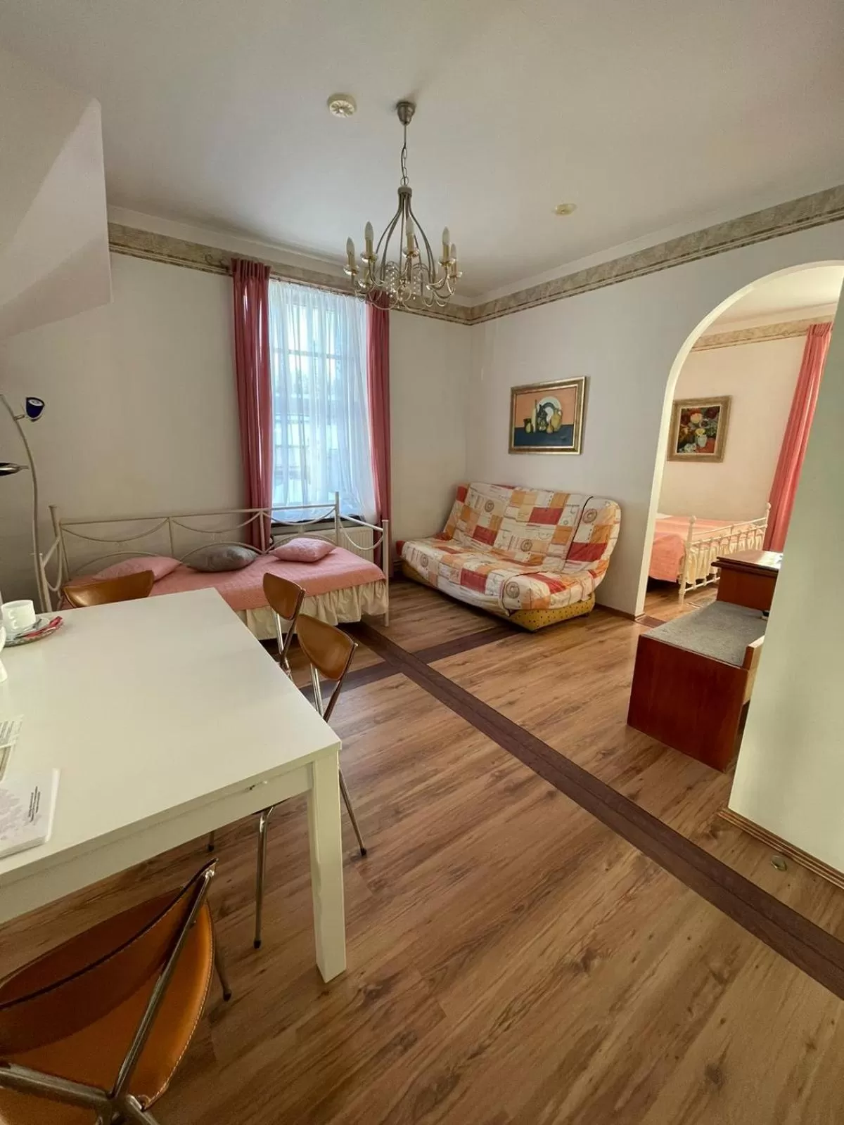 Living room, Bed in NB Hotel with Free Parking