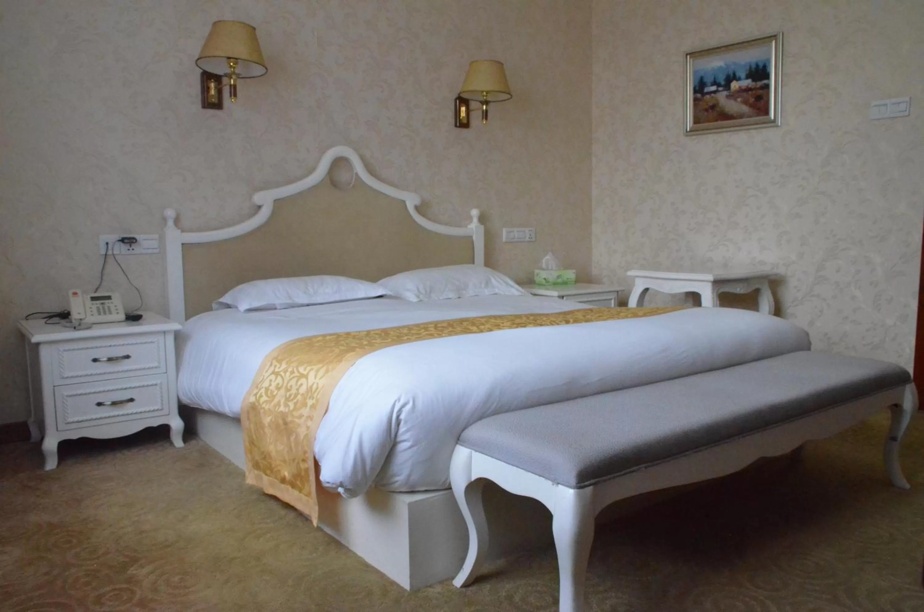 Bed in Soluxe Club International Hotel