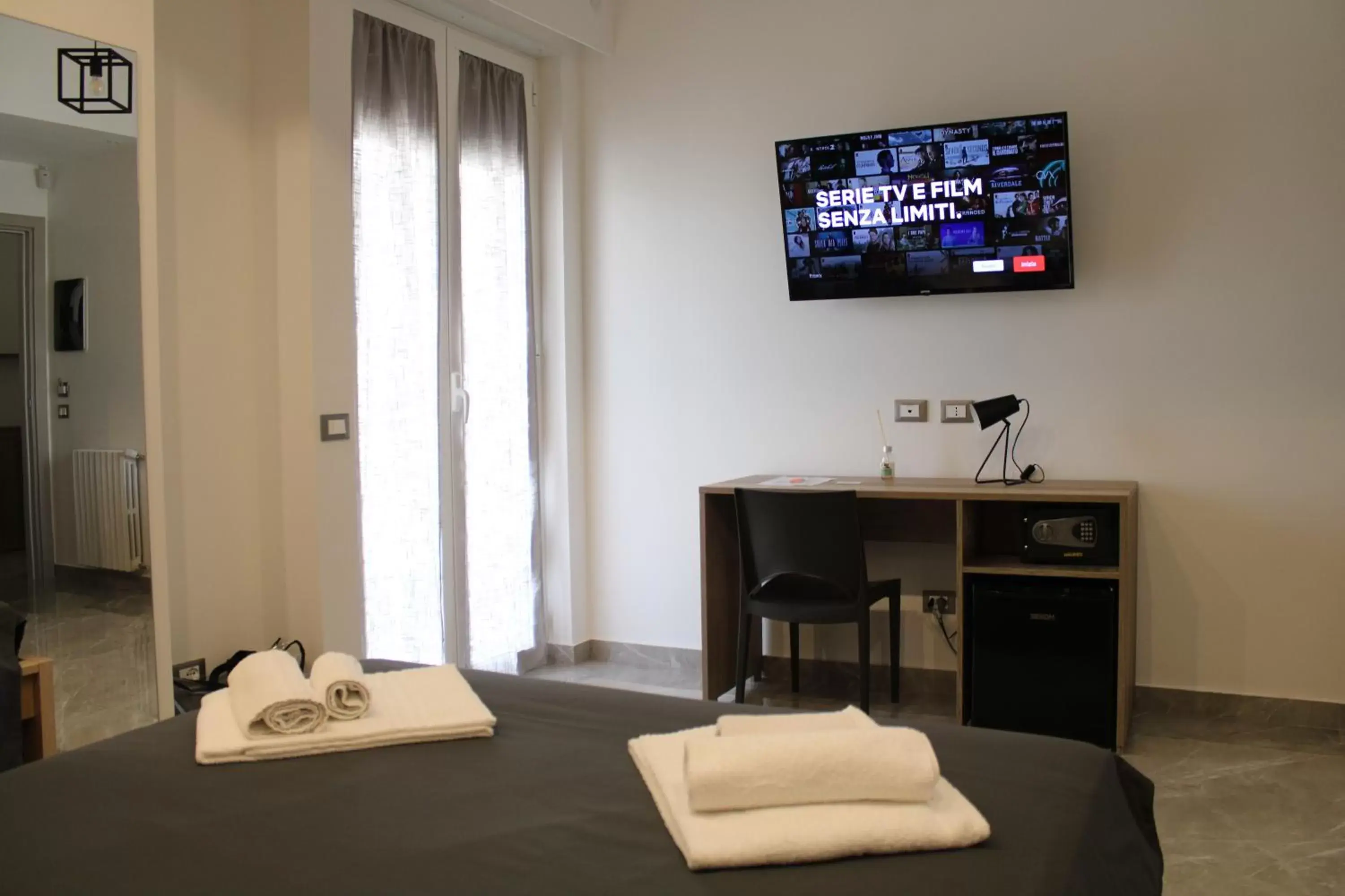 Bed, TV/Entertainment Center in B&B D'Amari Affittacamere