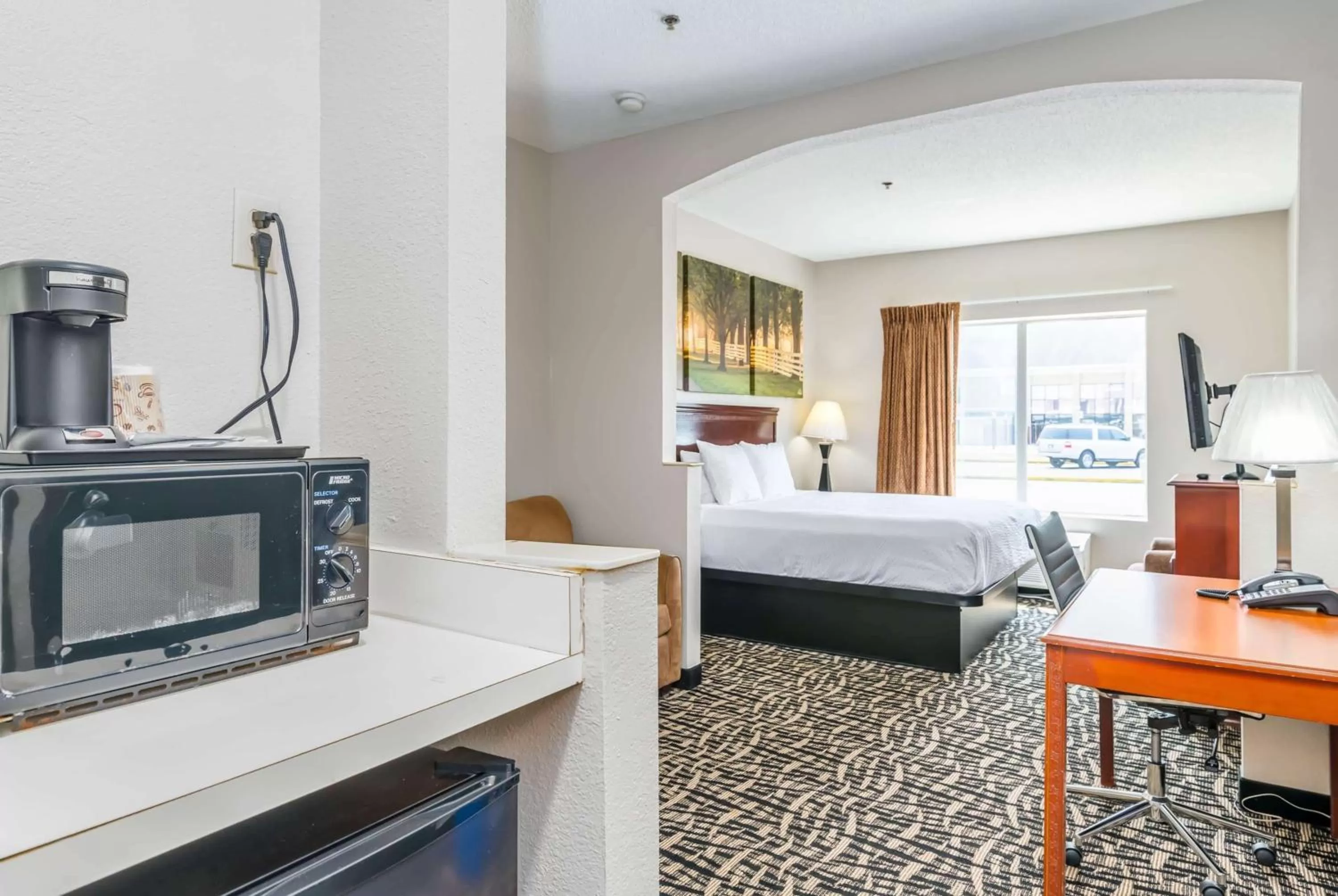 Photo of the whole room, Bed in Days Inn by Wyndham Coliseum Montgomery AL