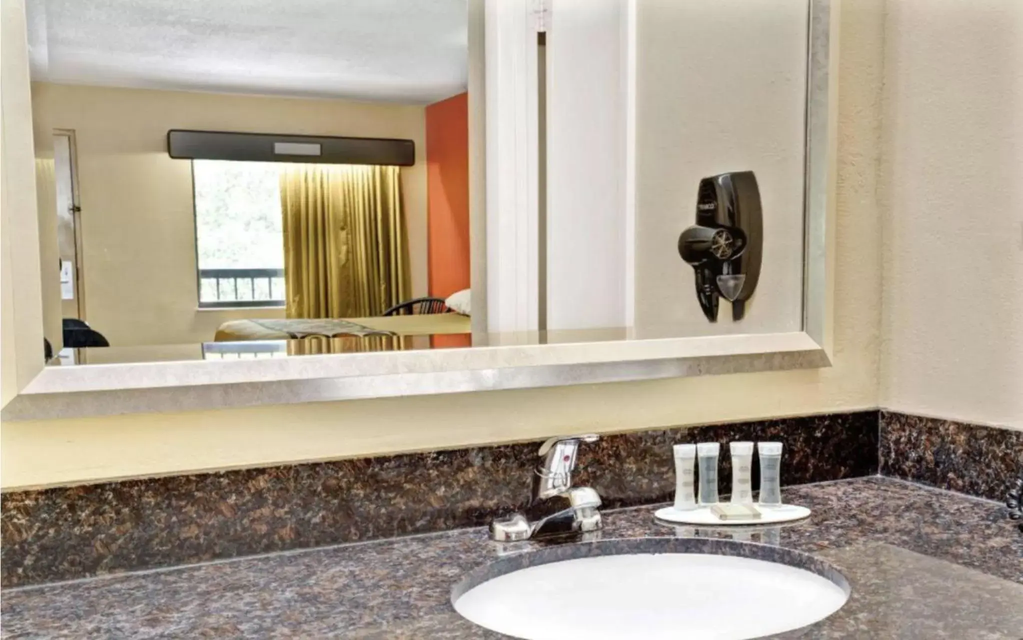 Bathroom in Super 8 by Wyndham Kissimmee/Maingate/Orlando Area