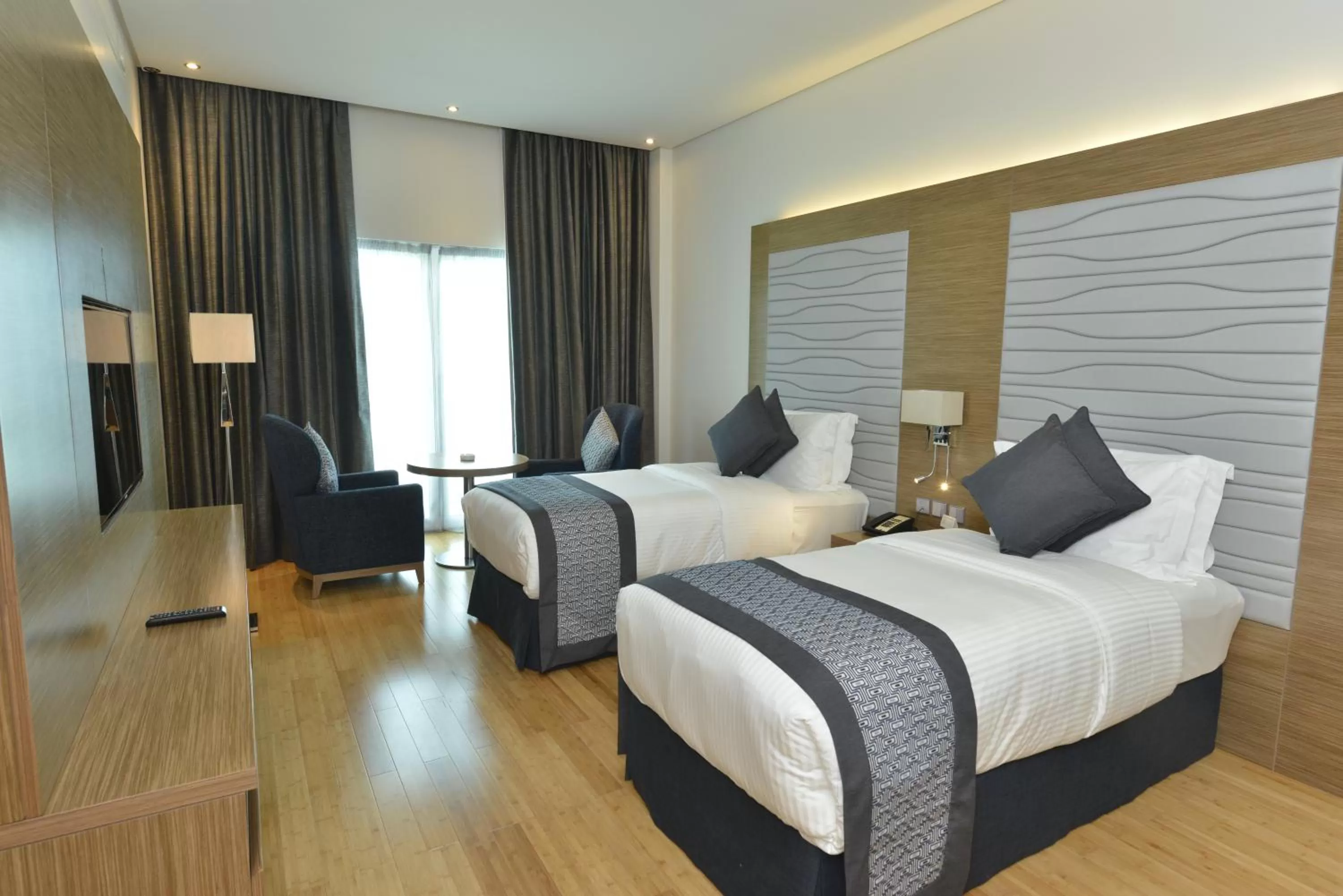 Shower, Bed in Ramada by Wyndham Manama City Centre