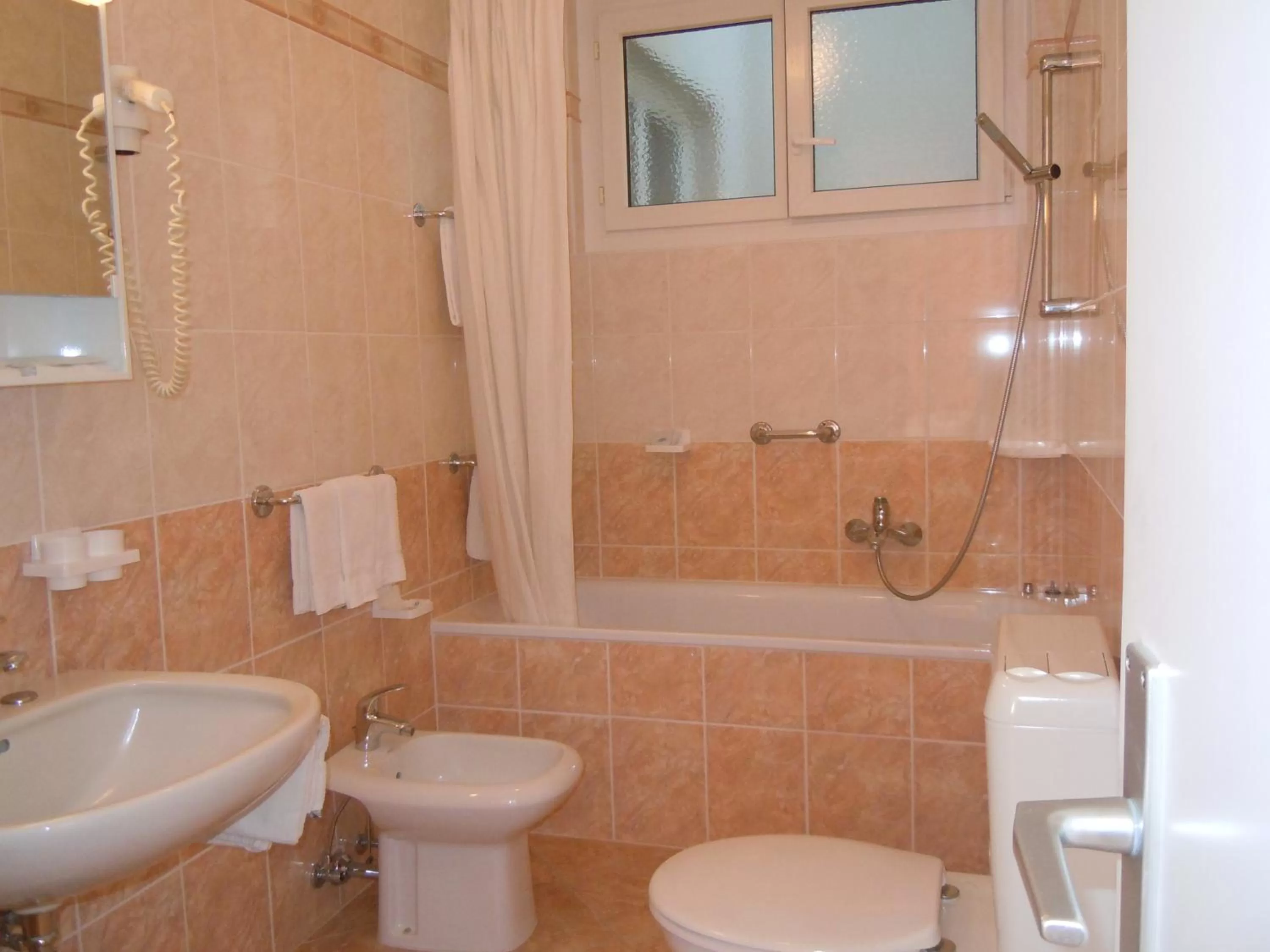 Bathroom in Swiss Lodge Nassa Garni