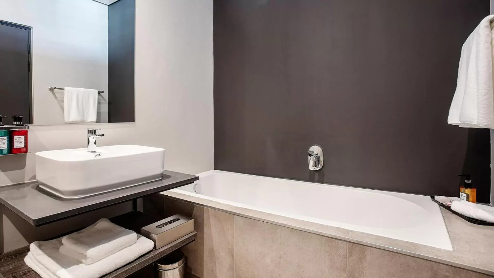 Bathroom in The Catalyst Apartment Hotel by NEWMARK