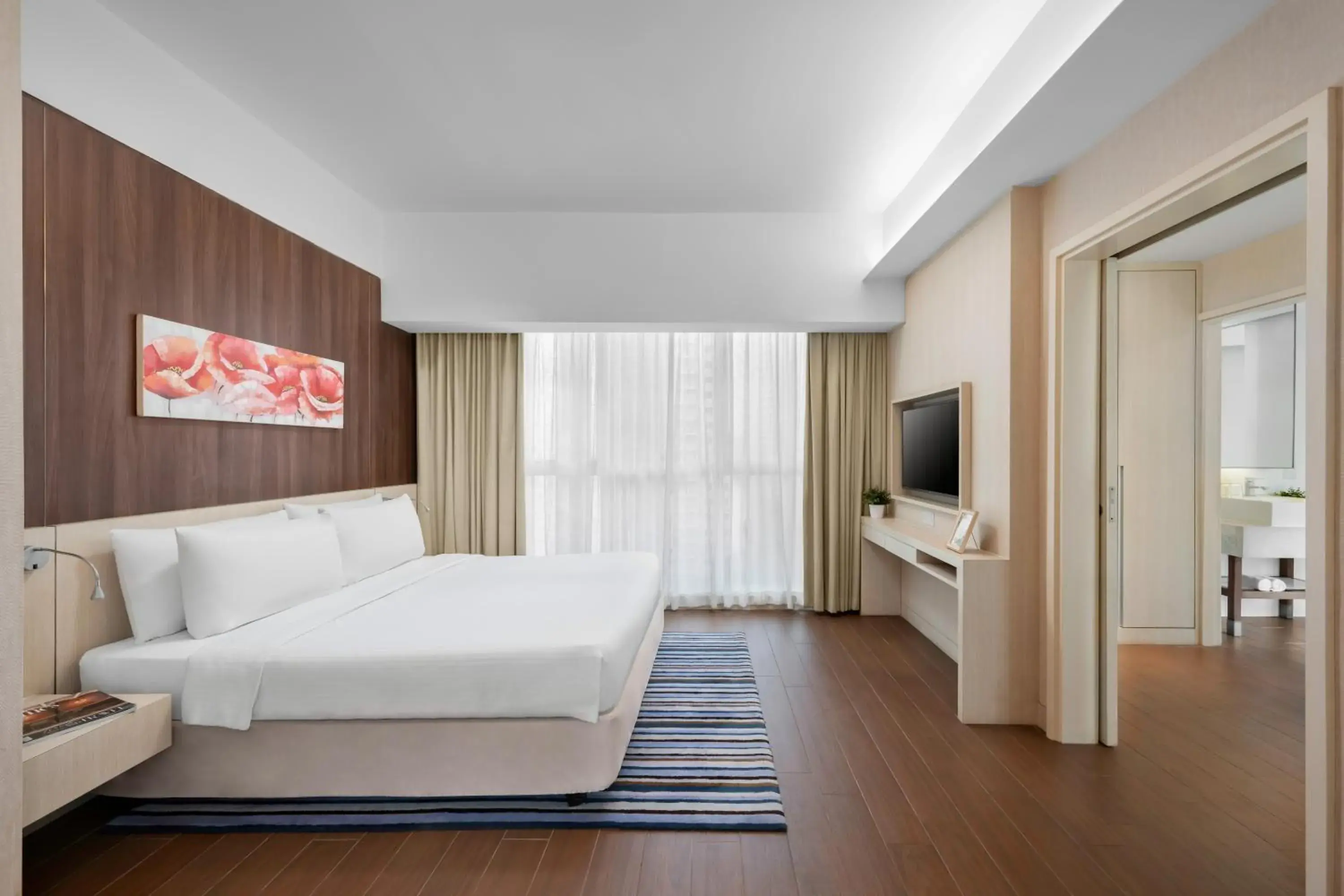 Bed, Seating Area in Oasia Suites Kuala Lumpur by Far East Hospitality