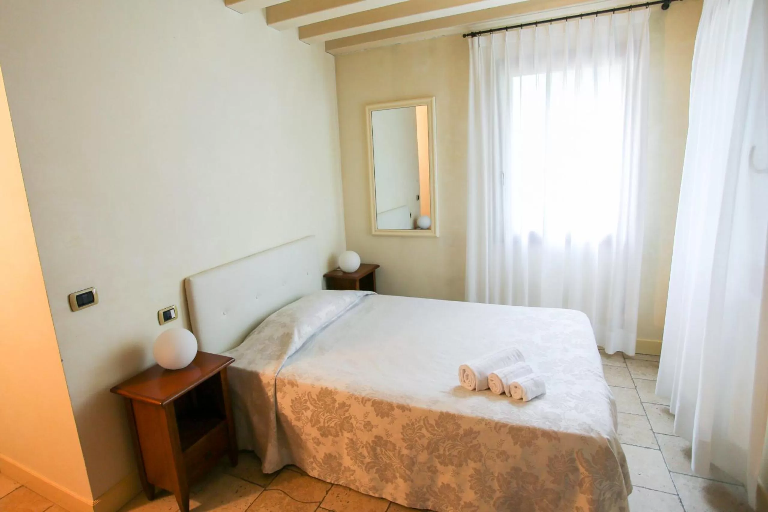 Bed in Relais Villa Selvatico