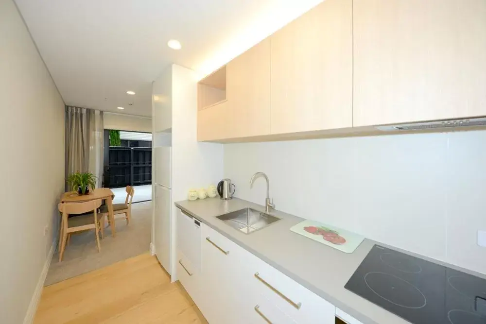 Kitchen/Kitchenette in West Fitzroy Apartments