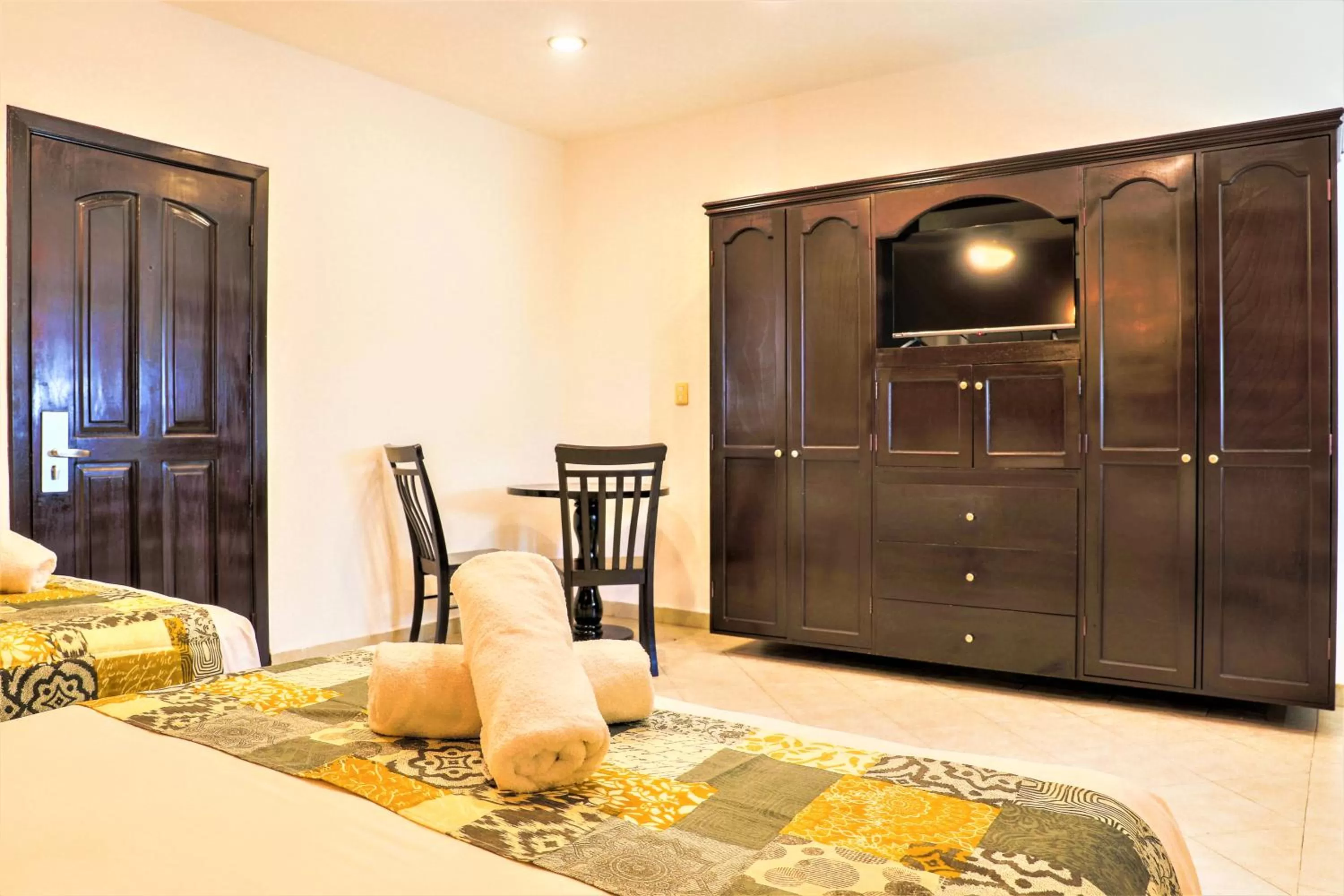 Bed in Hotel Colonial Playa del Carmen