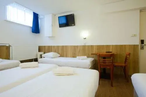 Bed in Hotel Titus City Centre