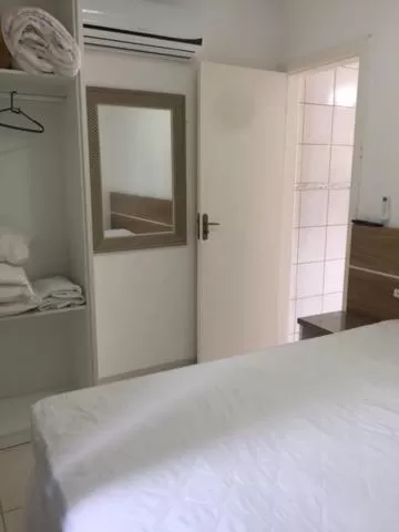 Bed in Pousada Almeida