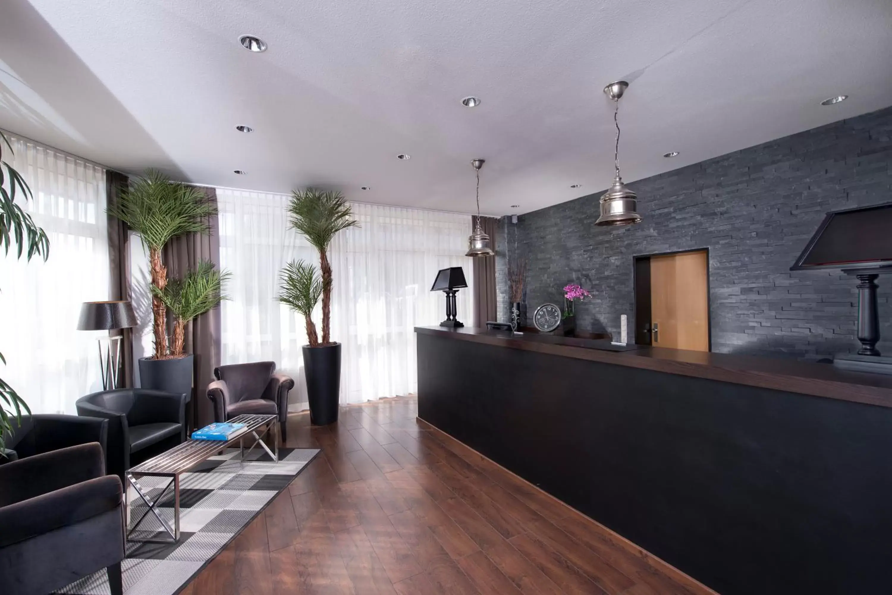 Lobby or reception in Tryp by Wyndham Luebeck Aquamarin Lobby or reception in Tryp by Wyndham Luebeck Aquamarin