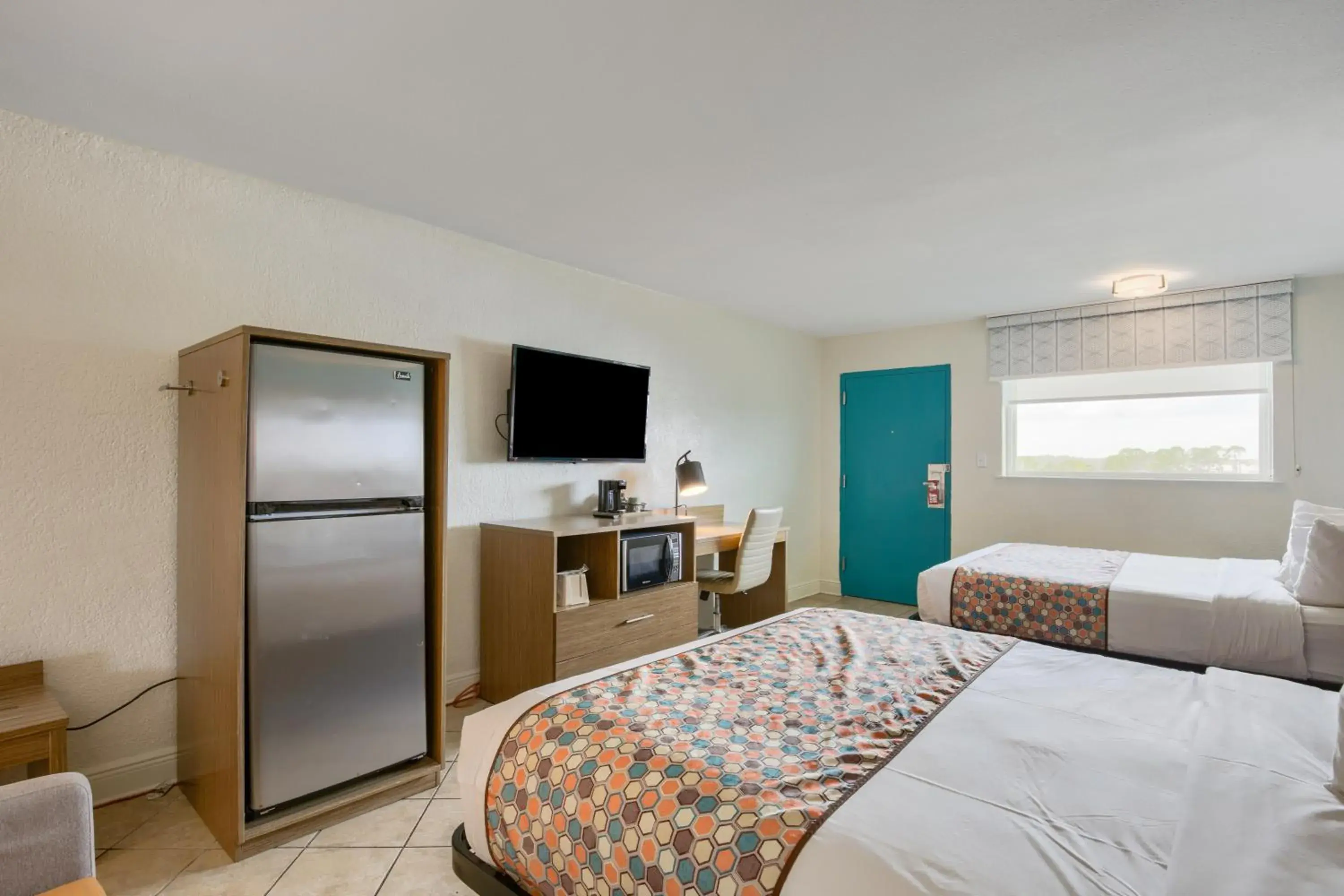 TV and multimedia, Bed in Beachside Resort Hotel